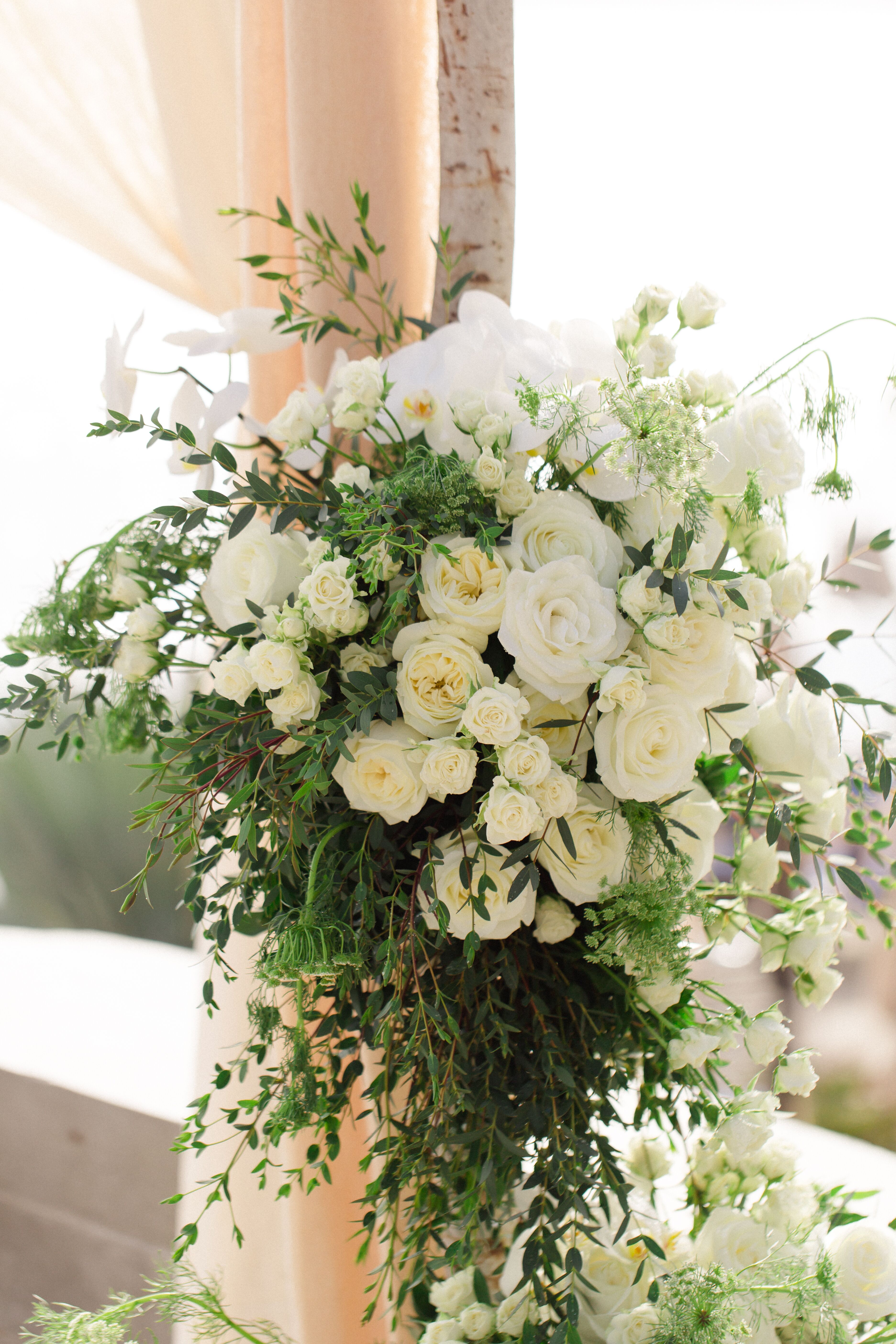 Cascading Ivory Rose And Orchid Ceremony Arrangement