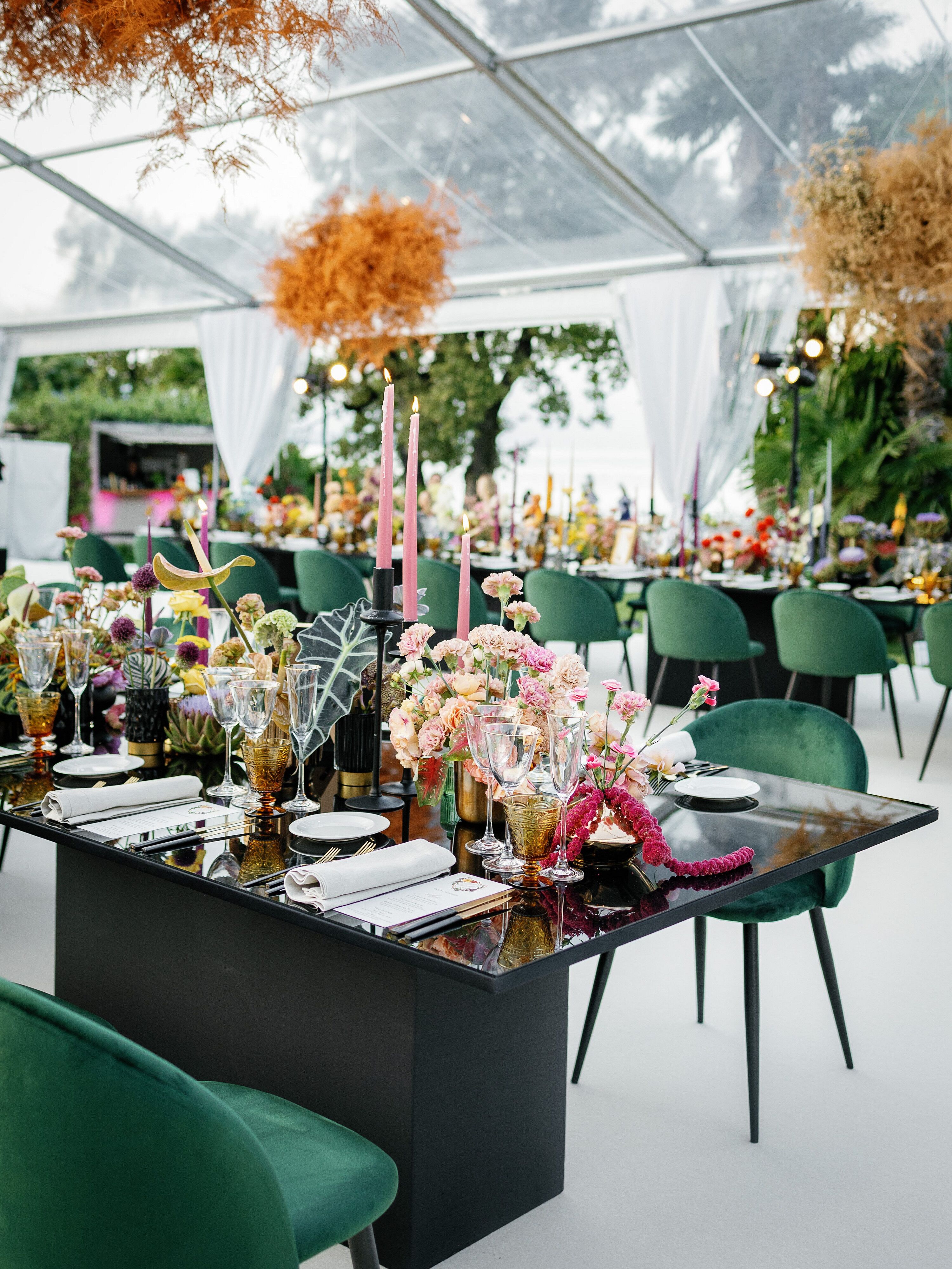 Dark Dining Tables, Velvet Green Chairs and Floral Centerpieces in ...