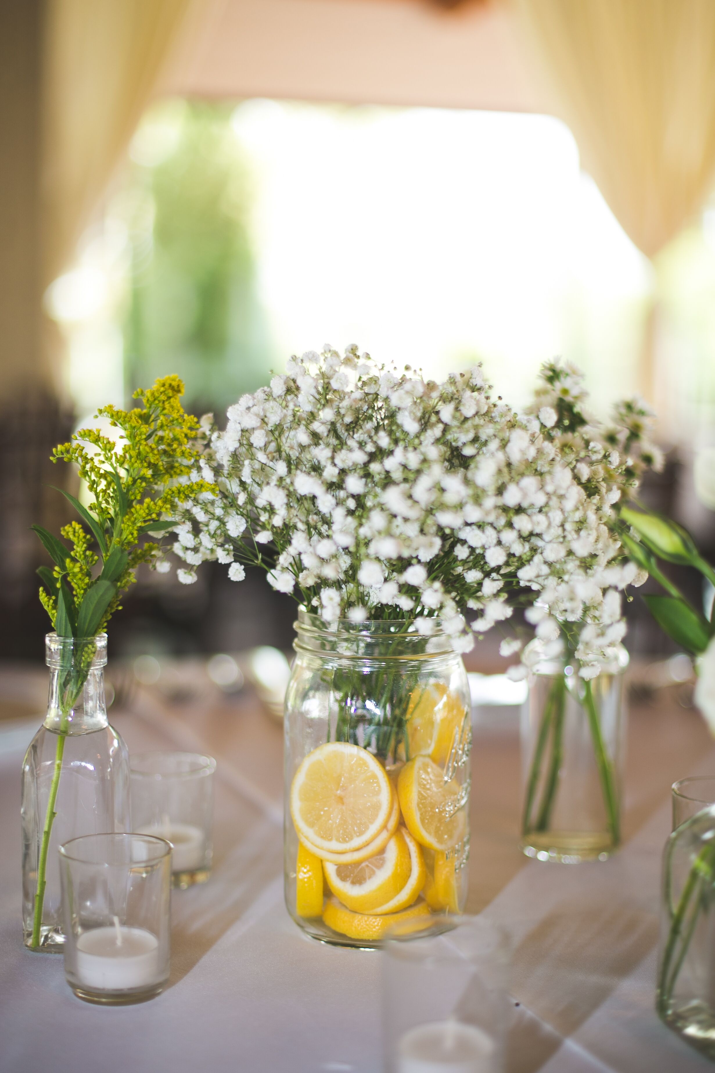 Mason Jars with Babys Breath and Lemon Table Decor