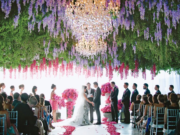 Jeannie Savage's hanging flowers tented wedding ceremony design