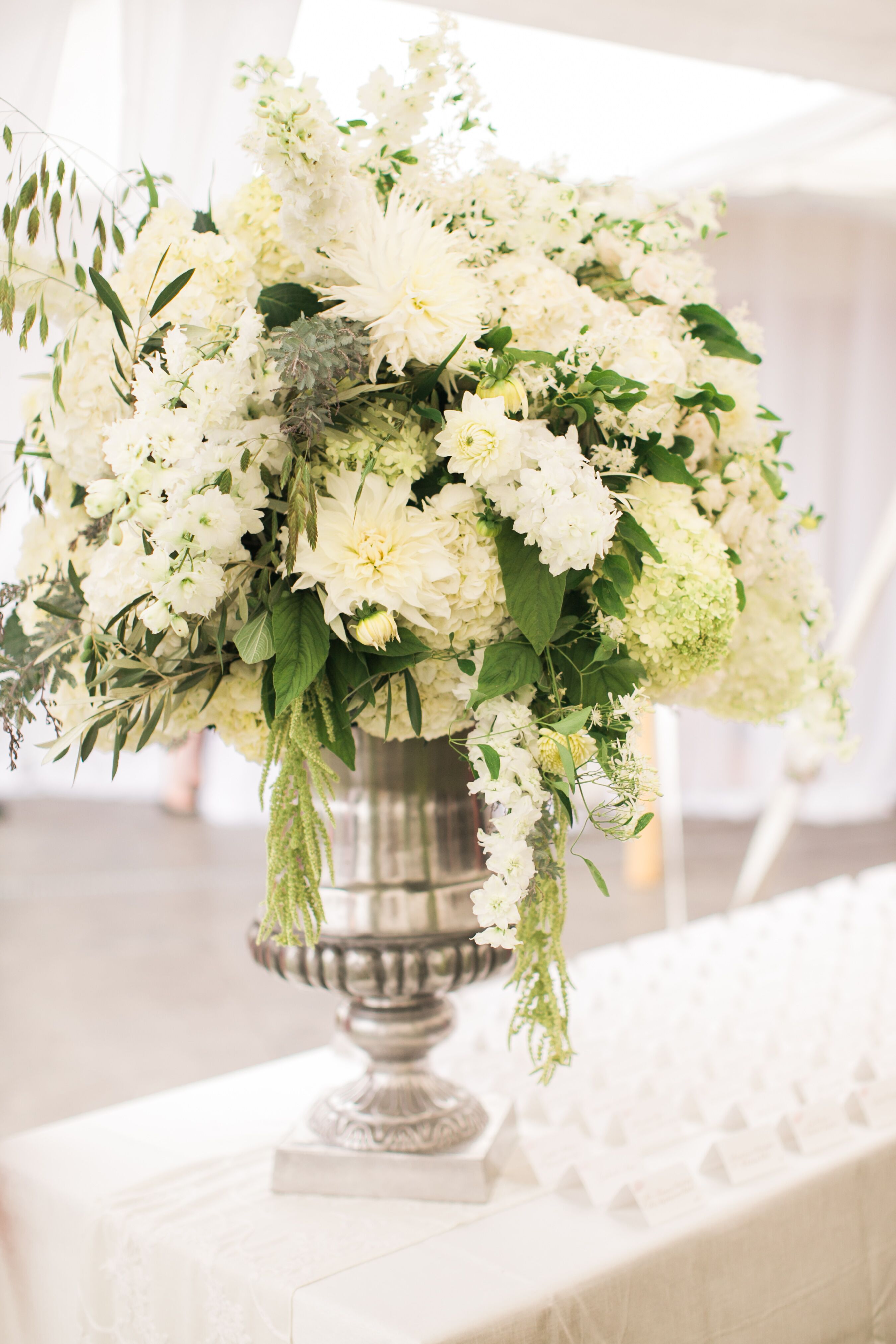 Elegant White Floral Arrangement in Silver Urn