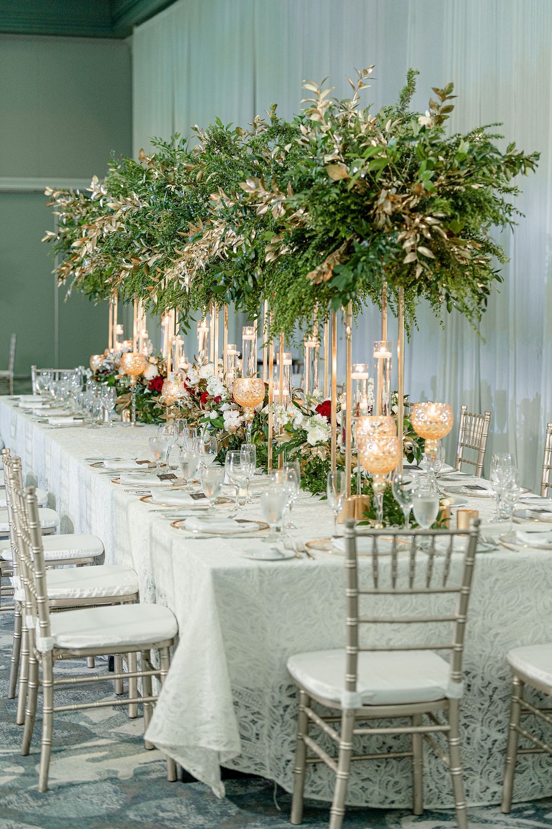 Tablescape With Candles and Tall Greenery Centerpiece