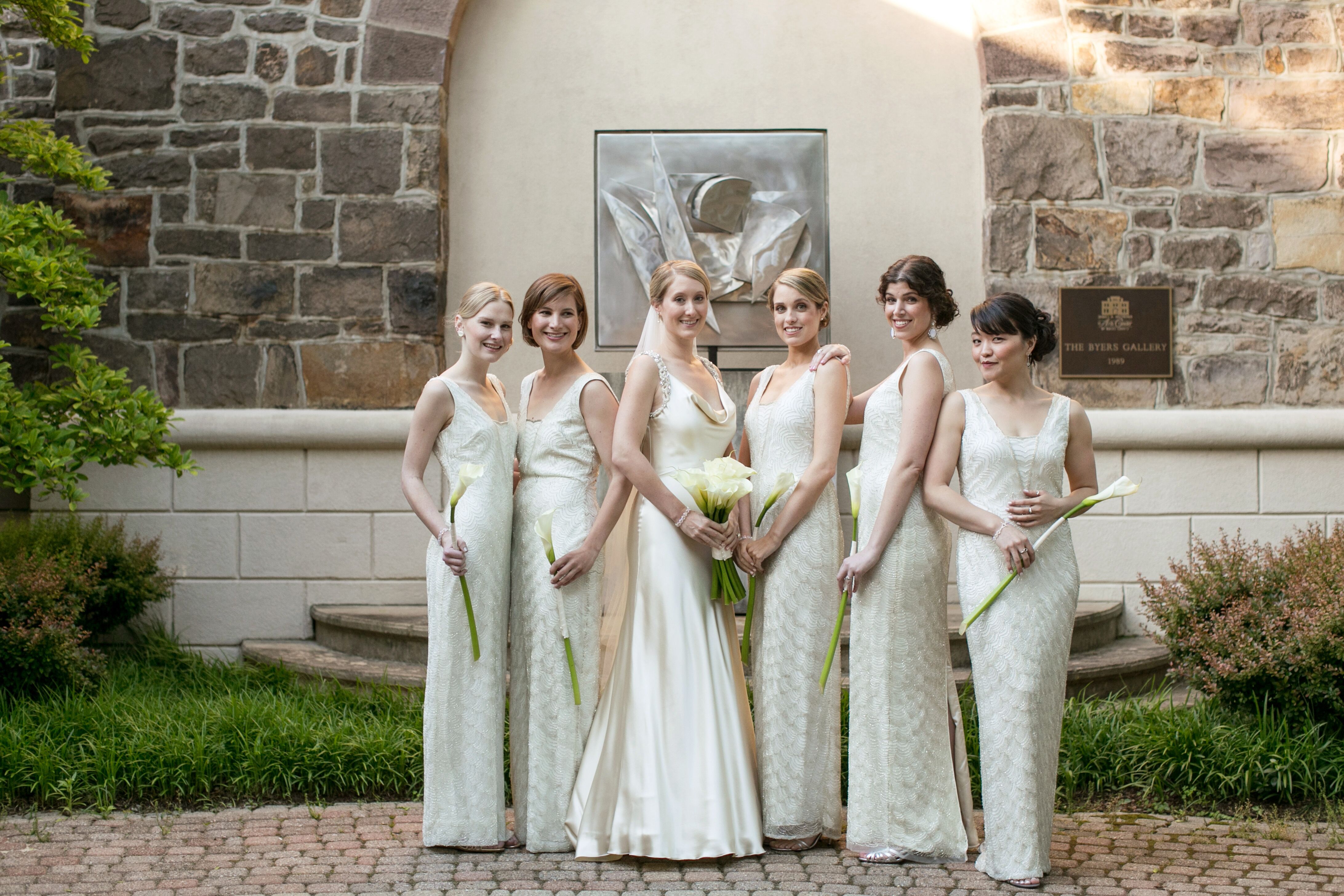 Bridesmaids in Long White Dresses with Silver Beading