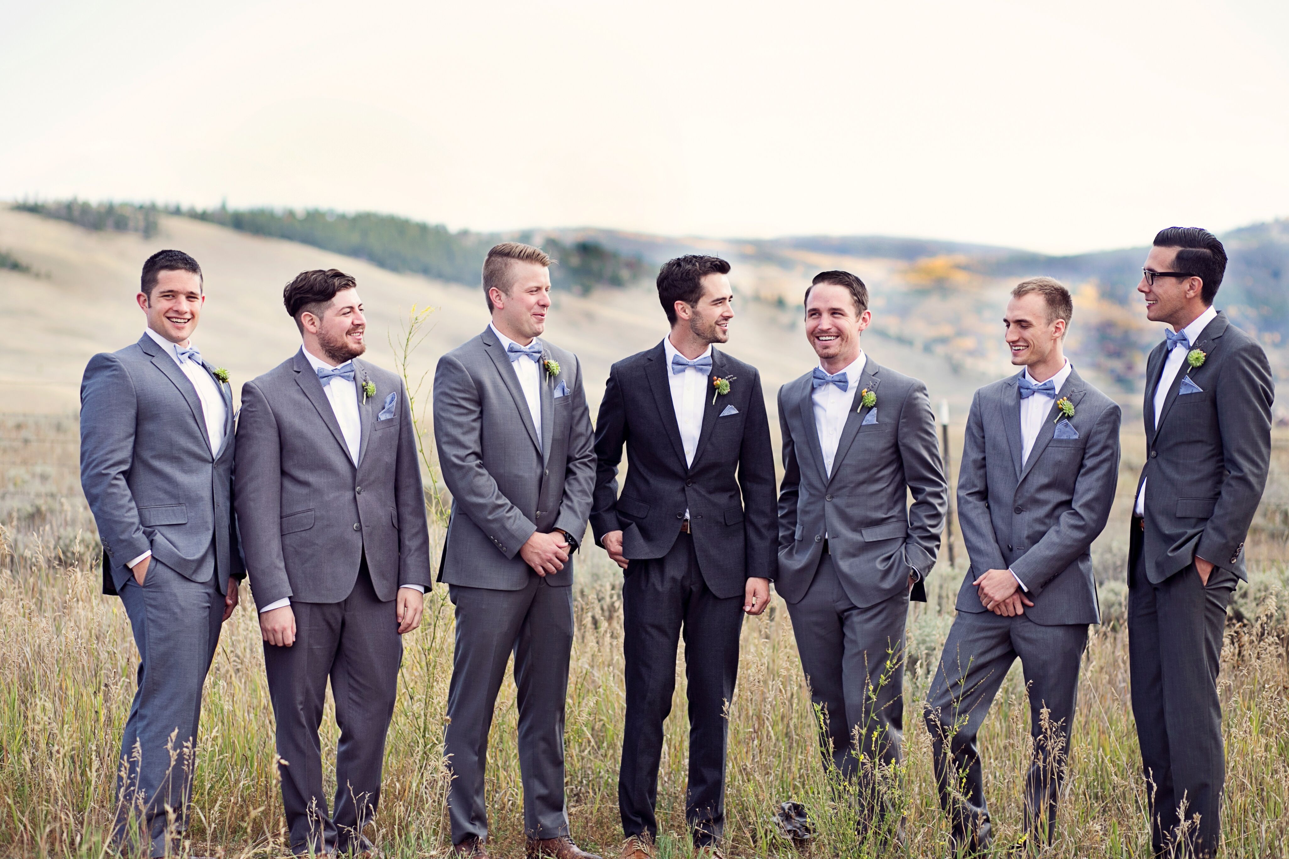 Gray Groomsmen Suits with Blue Bow Ties