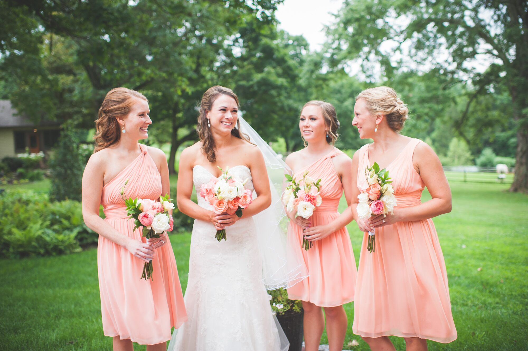 Bride and Bridesmaids With Peach Dresses