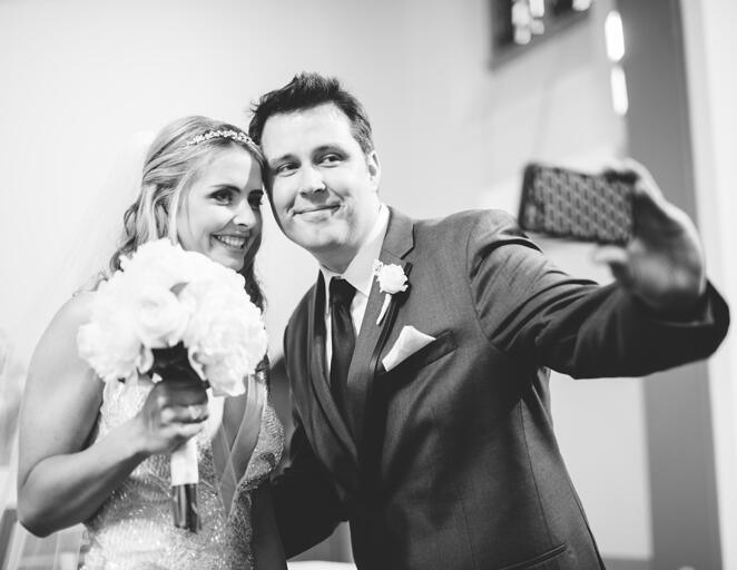 Bride and groom wedding selfie