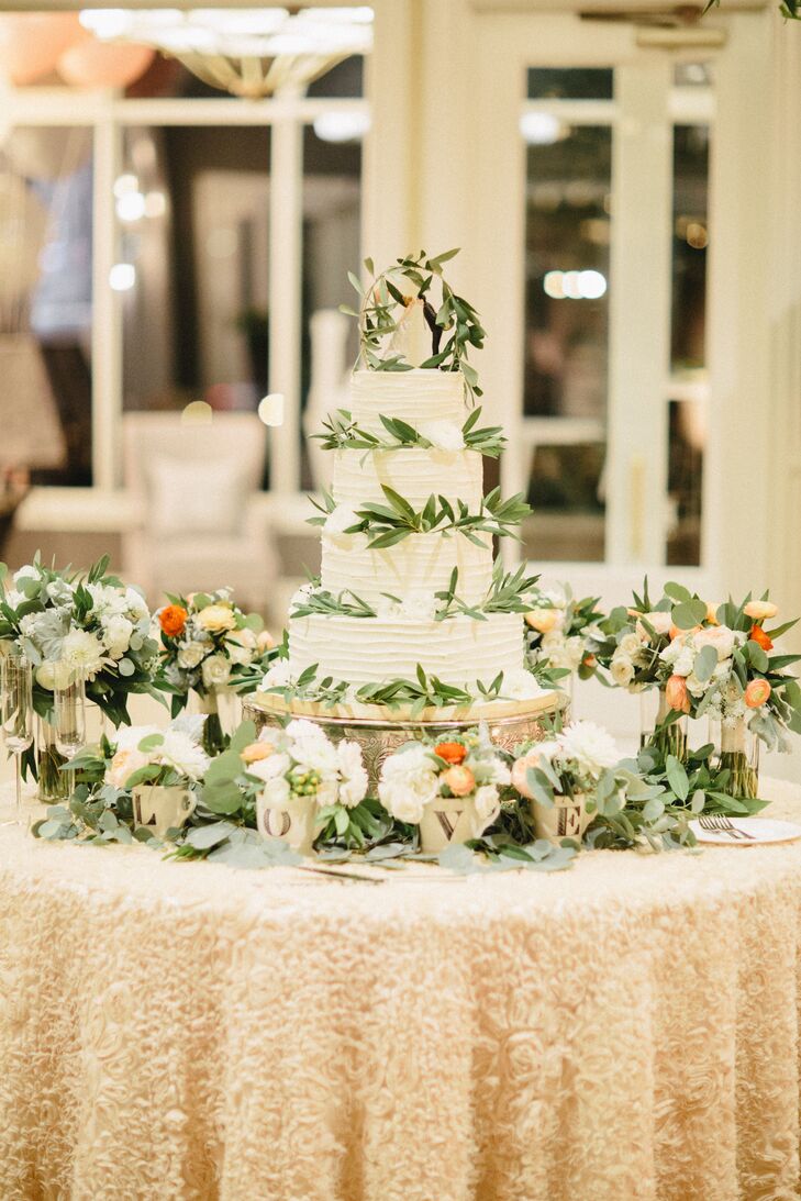 Textured Ivory Wedding  Cake  with Greenery  Branches