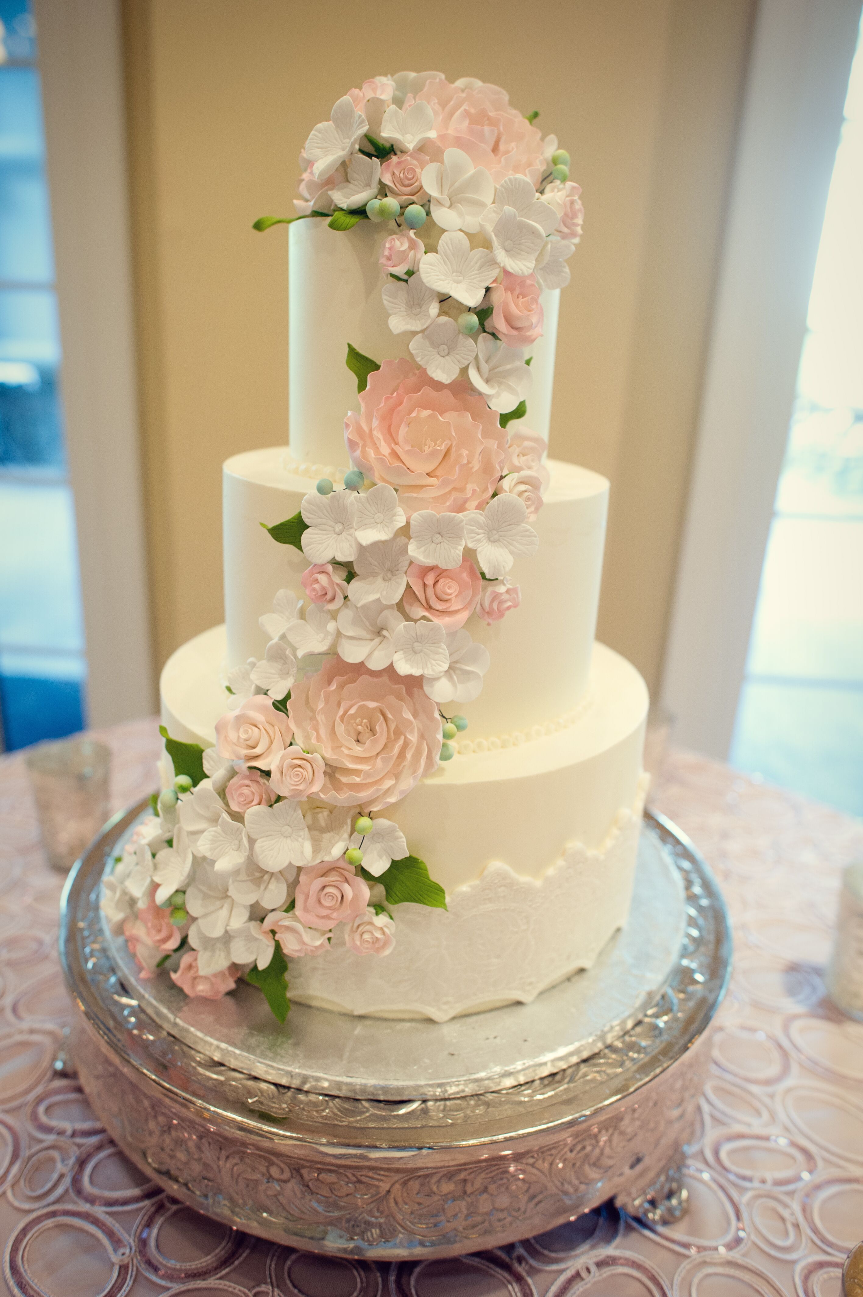 ThreeTier Wedding Cake with Cascading Fondant Flowers