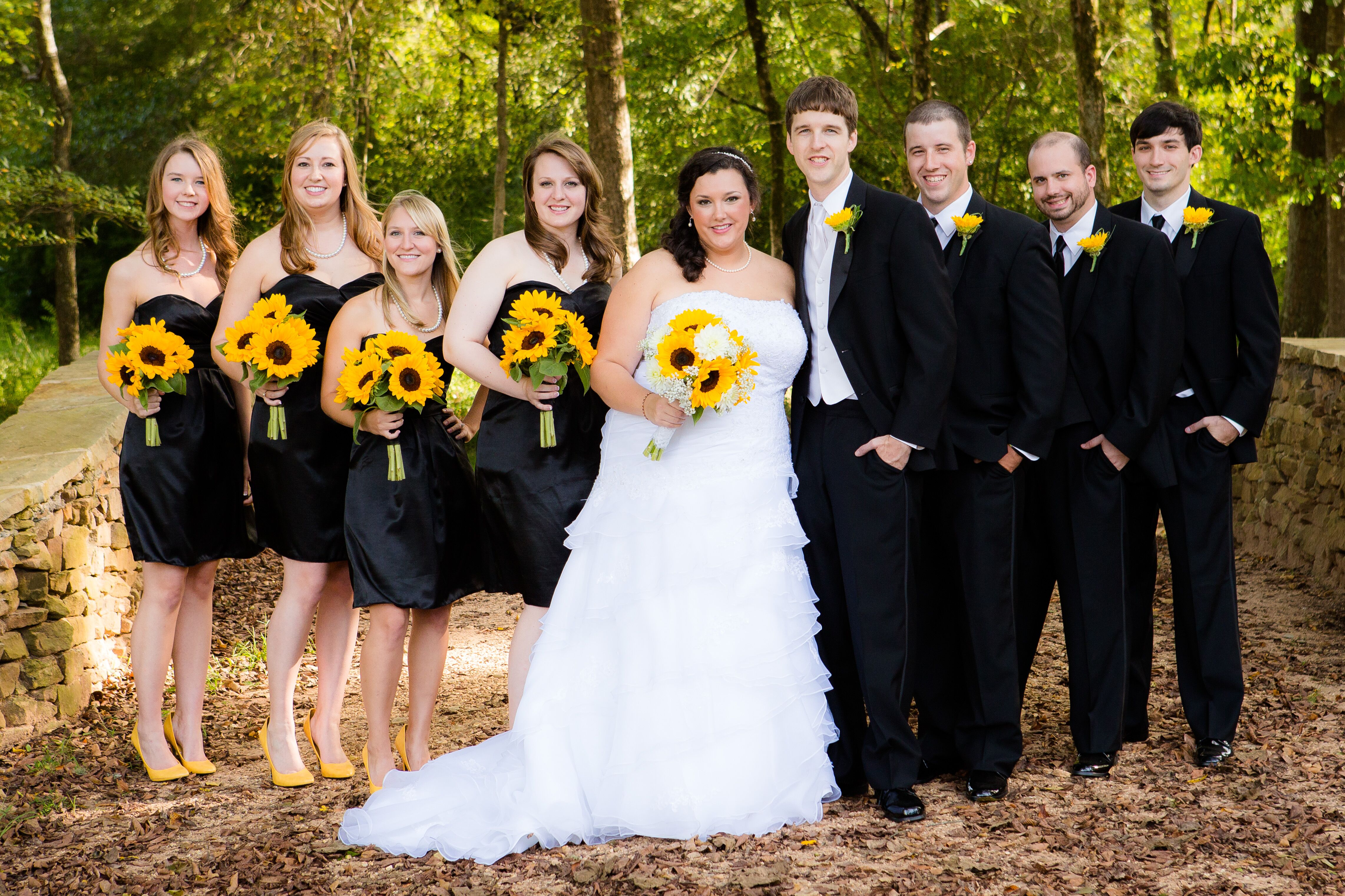 Black and White Wedding Party With Yellow Flowers