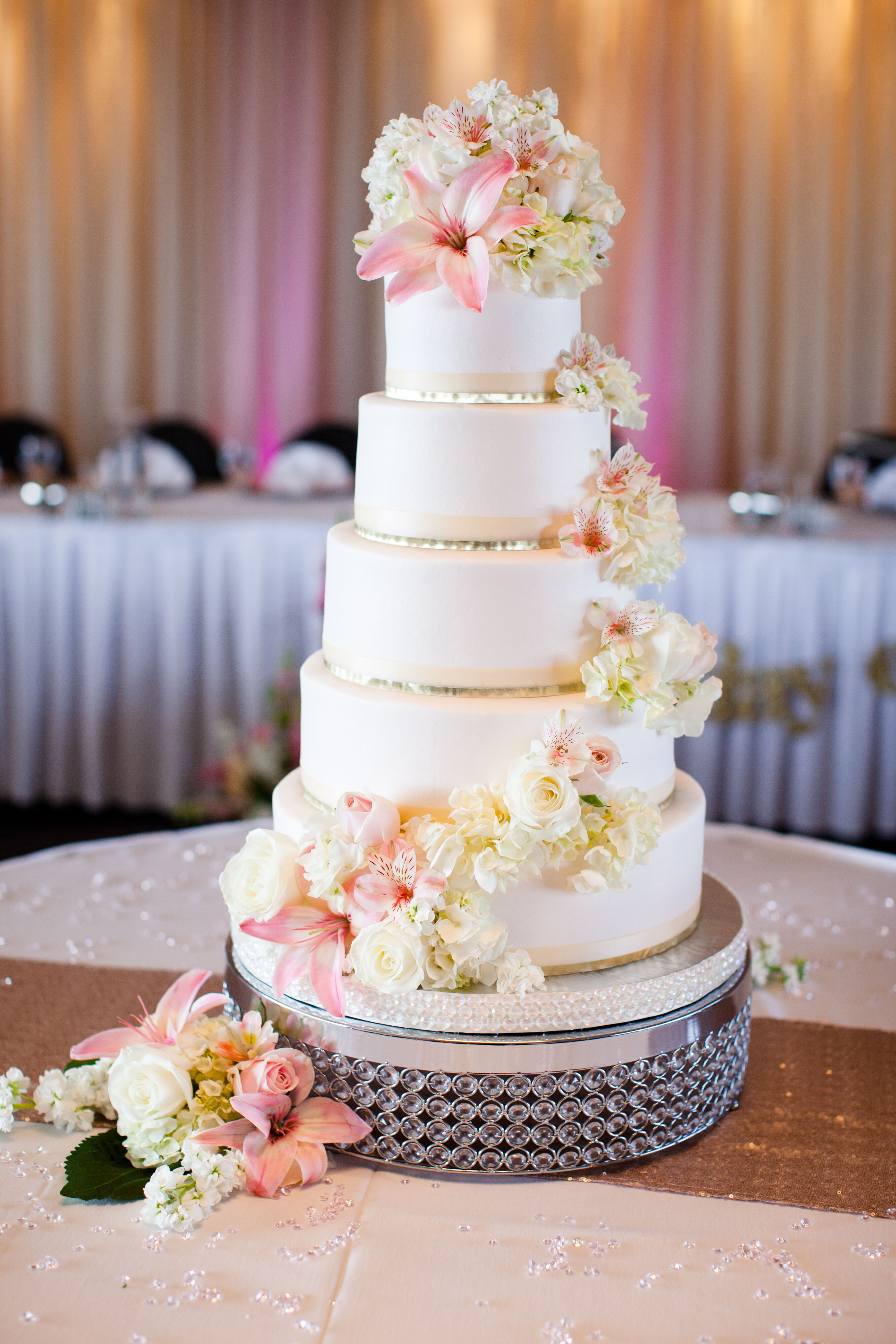 FiveTier White Fondant Cake with Cascading Flowers