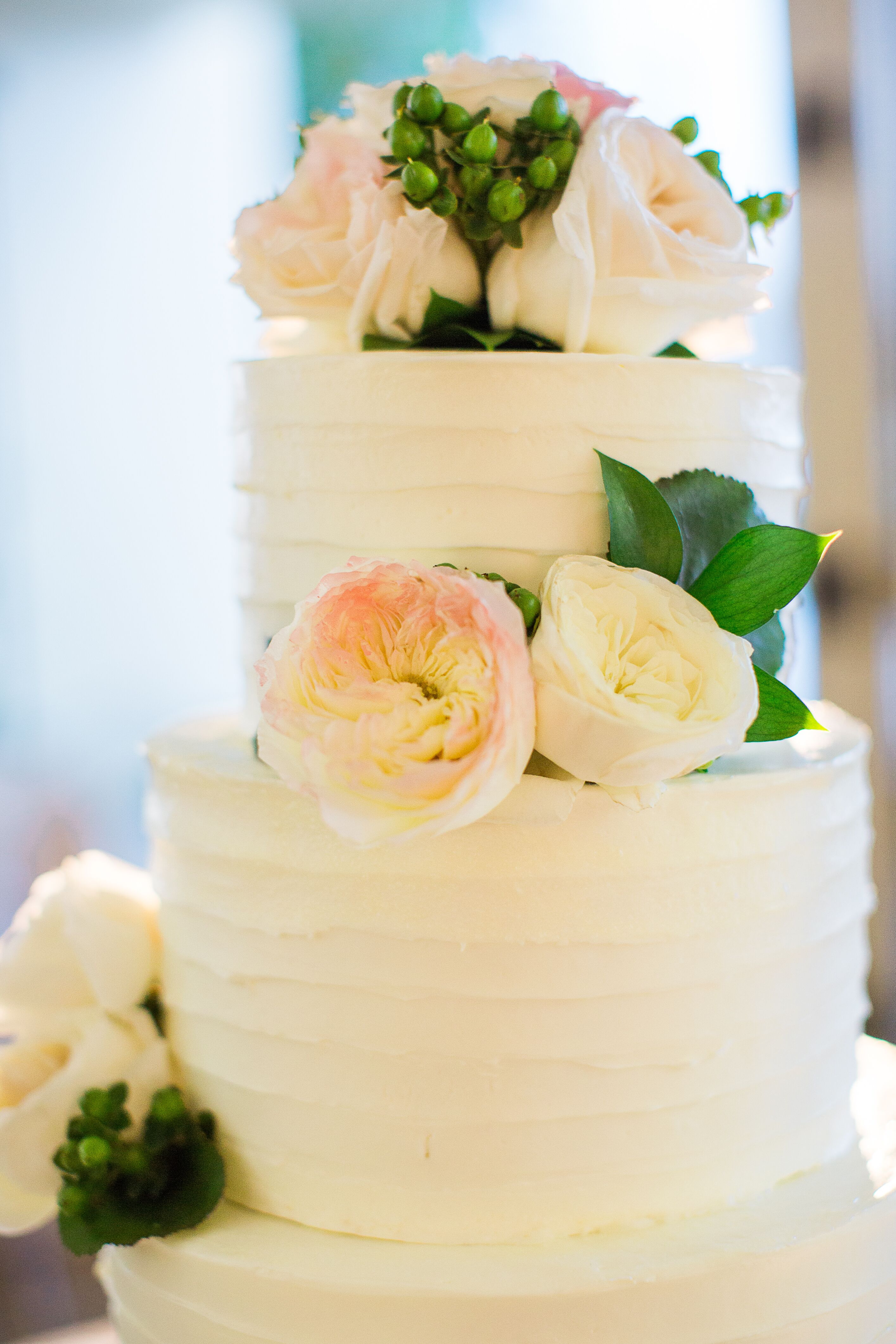 White Wedding Cake With Roses