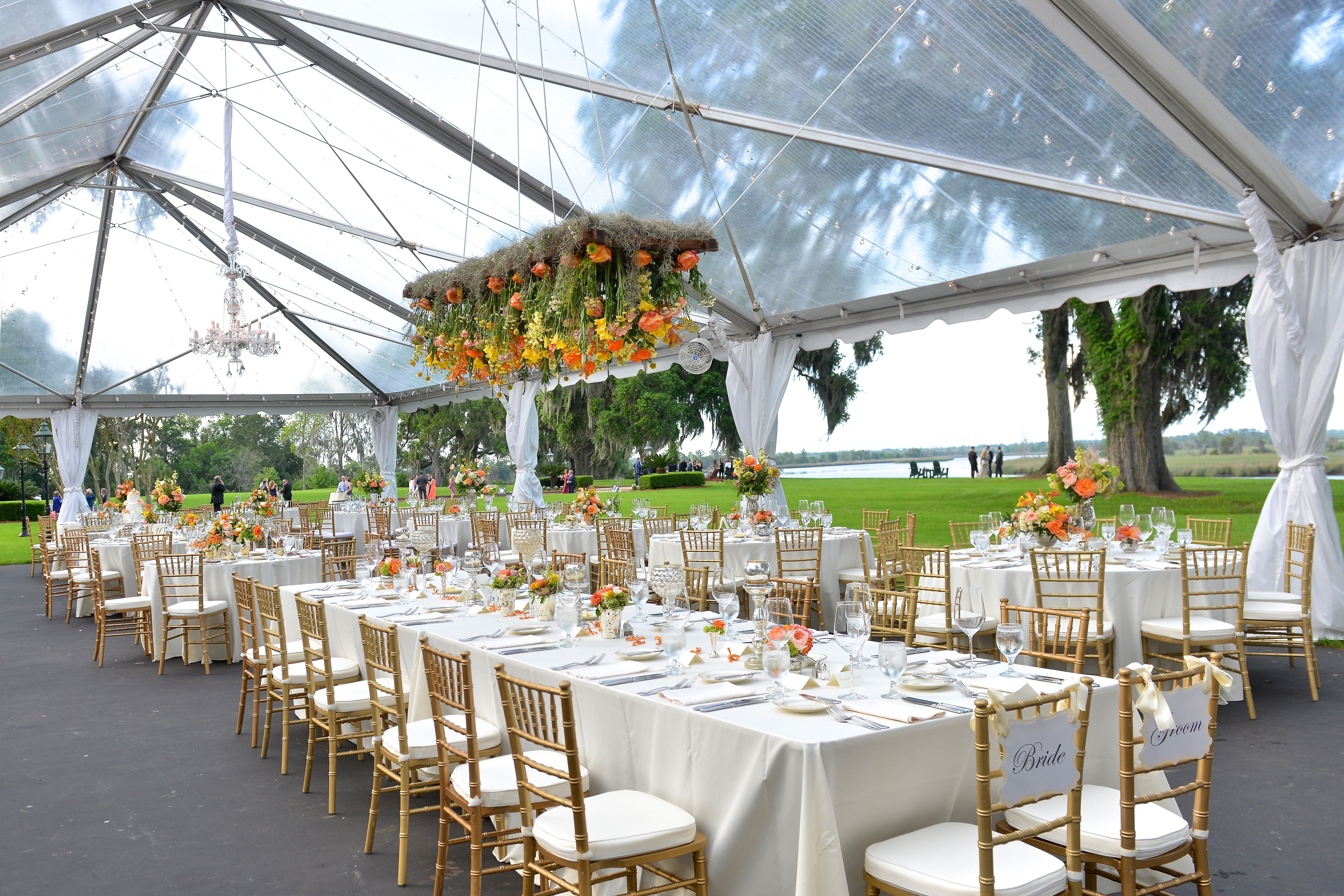 Hanging Wildflowers On Clear Tent Ceiling