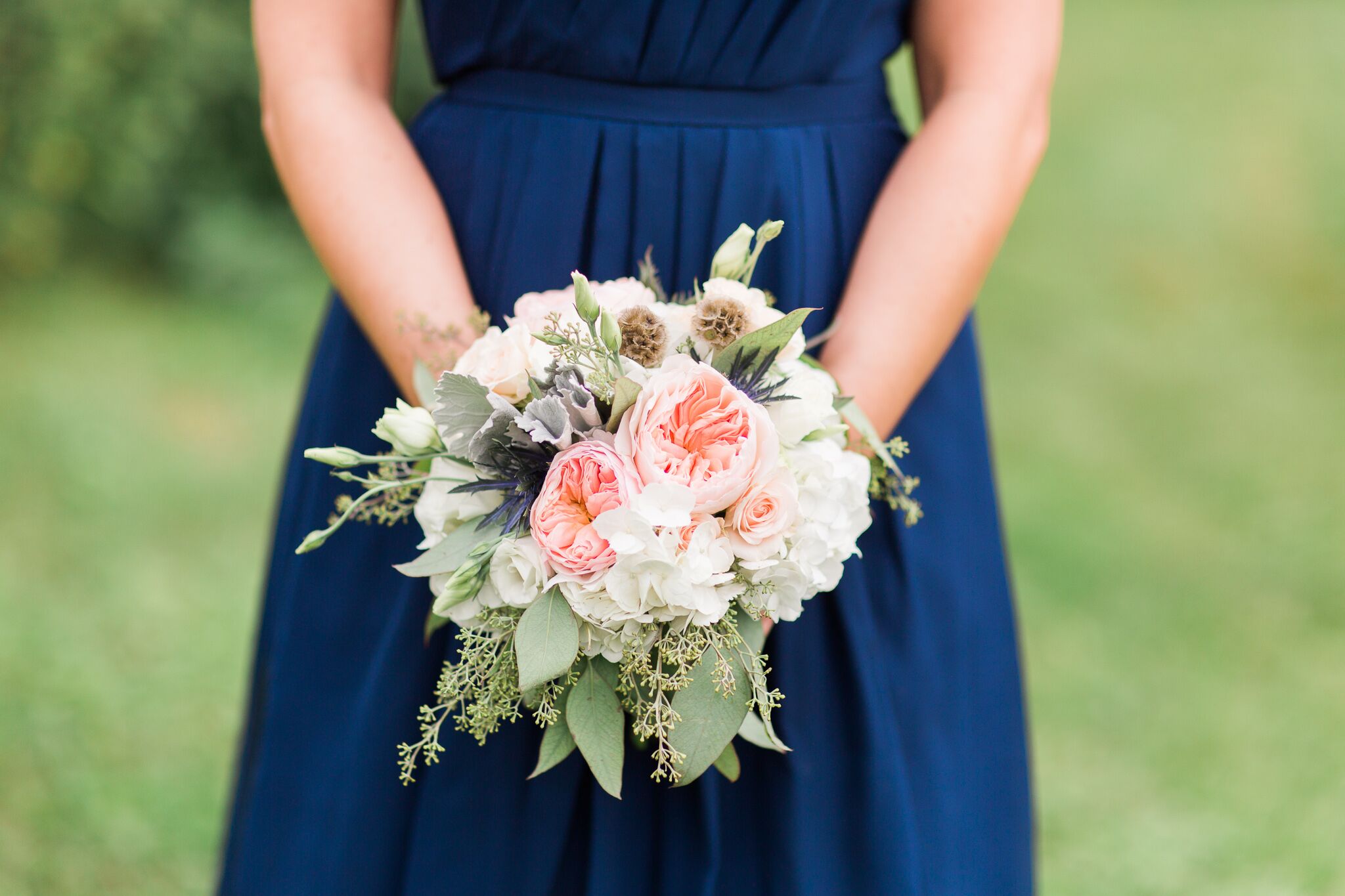 Navy Bridesmaid Dress and Peach and White Roses