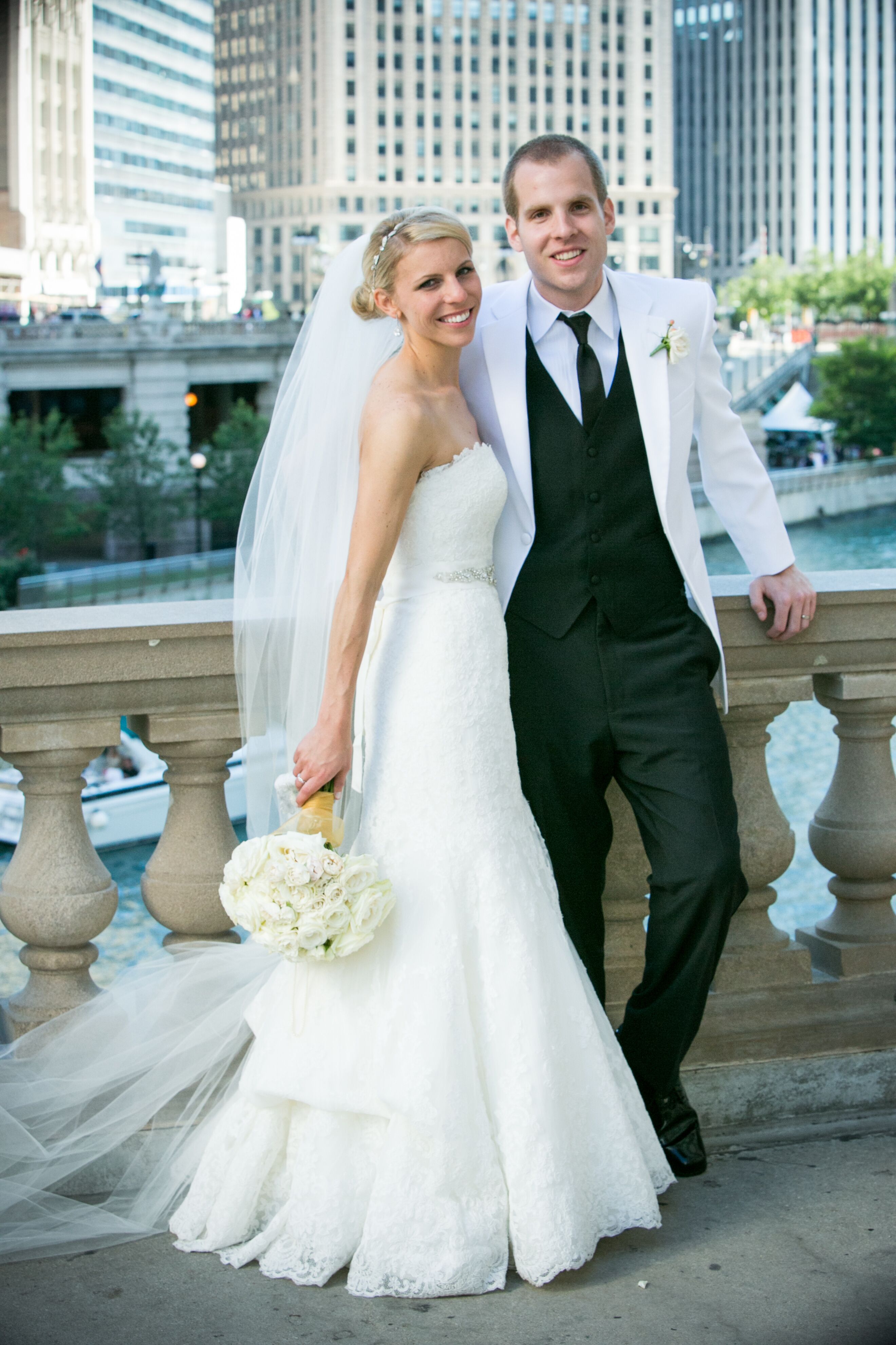 Lace Pronovias Wedding Dress and Black-and-White Tuxedo