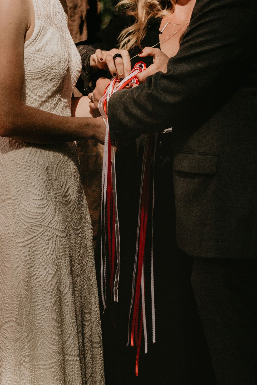 Handfasting Ceremony With Red Ribbon Symbolizing Chinese Culture