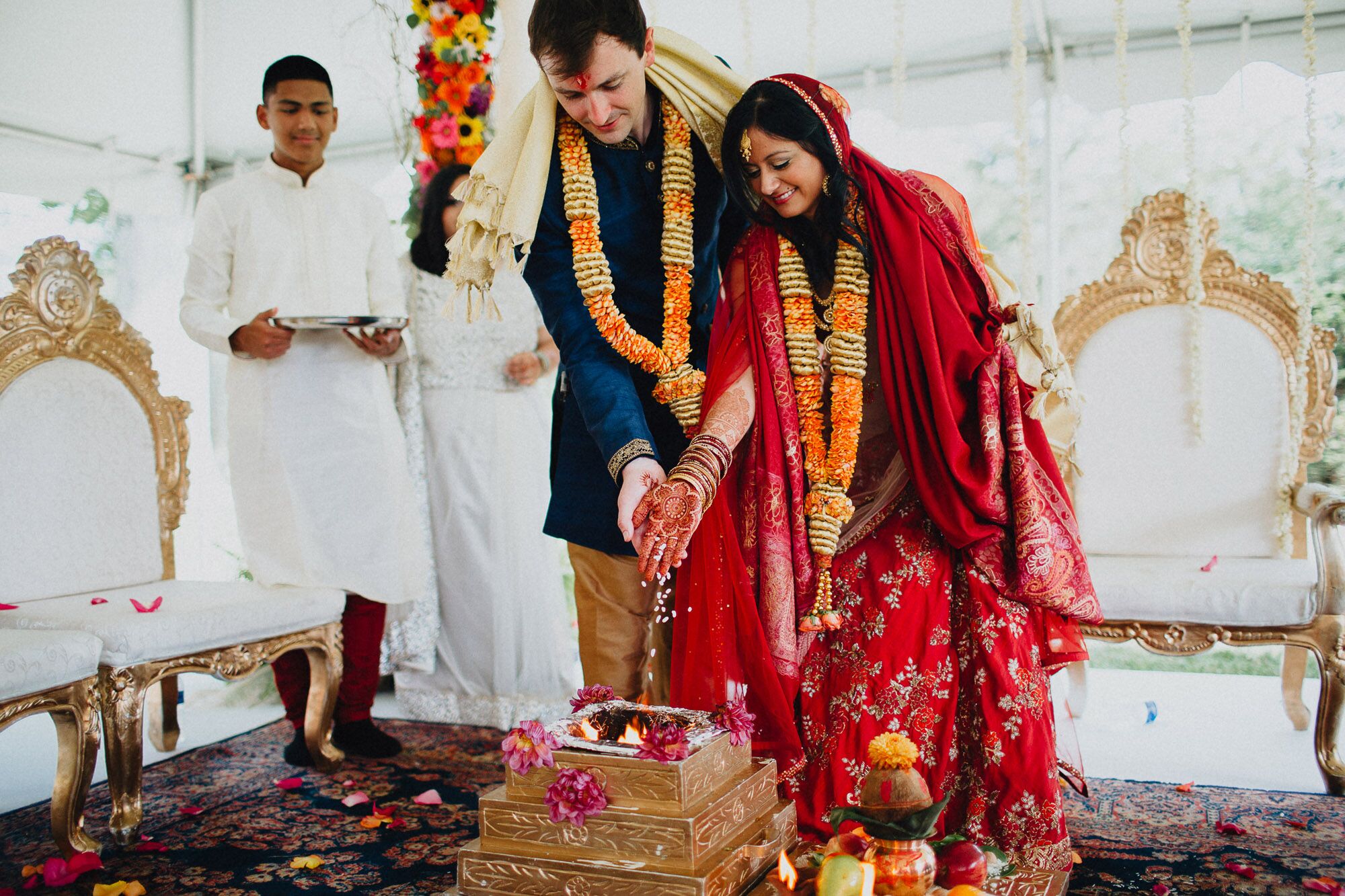 Interfaith Couple Participating In Traditional Hindu Ceremony