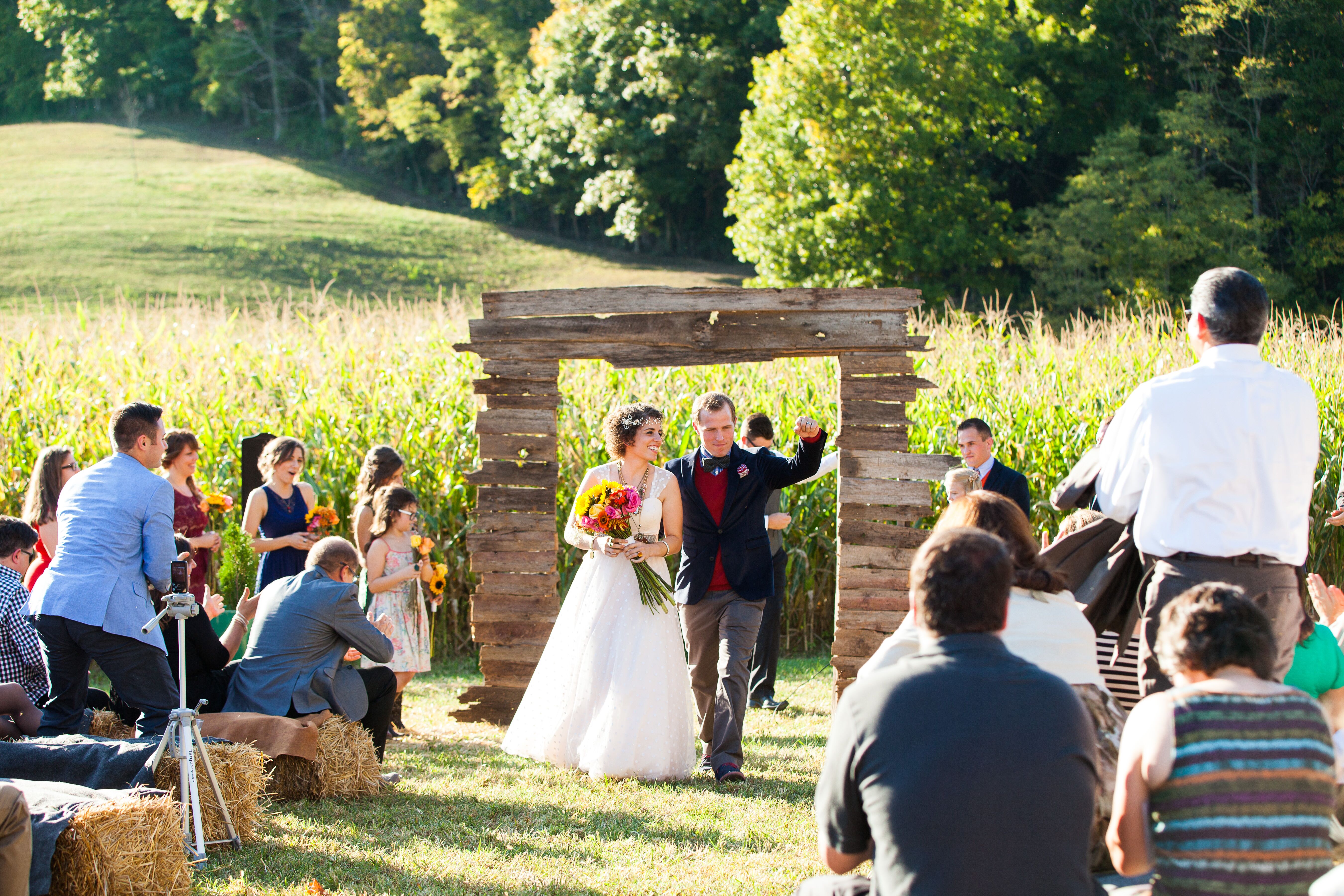 Wooden Ceremony Arch And Hay Bale Seating