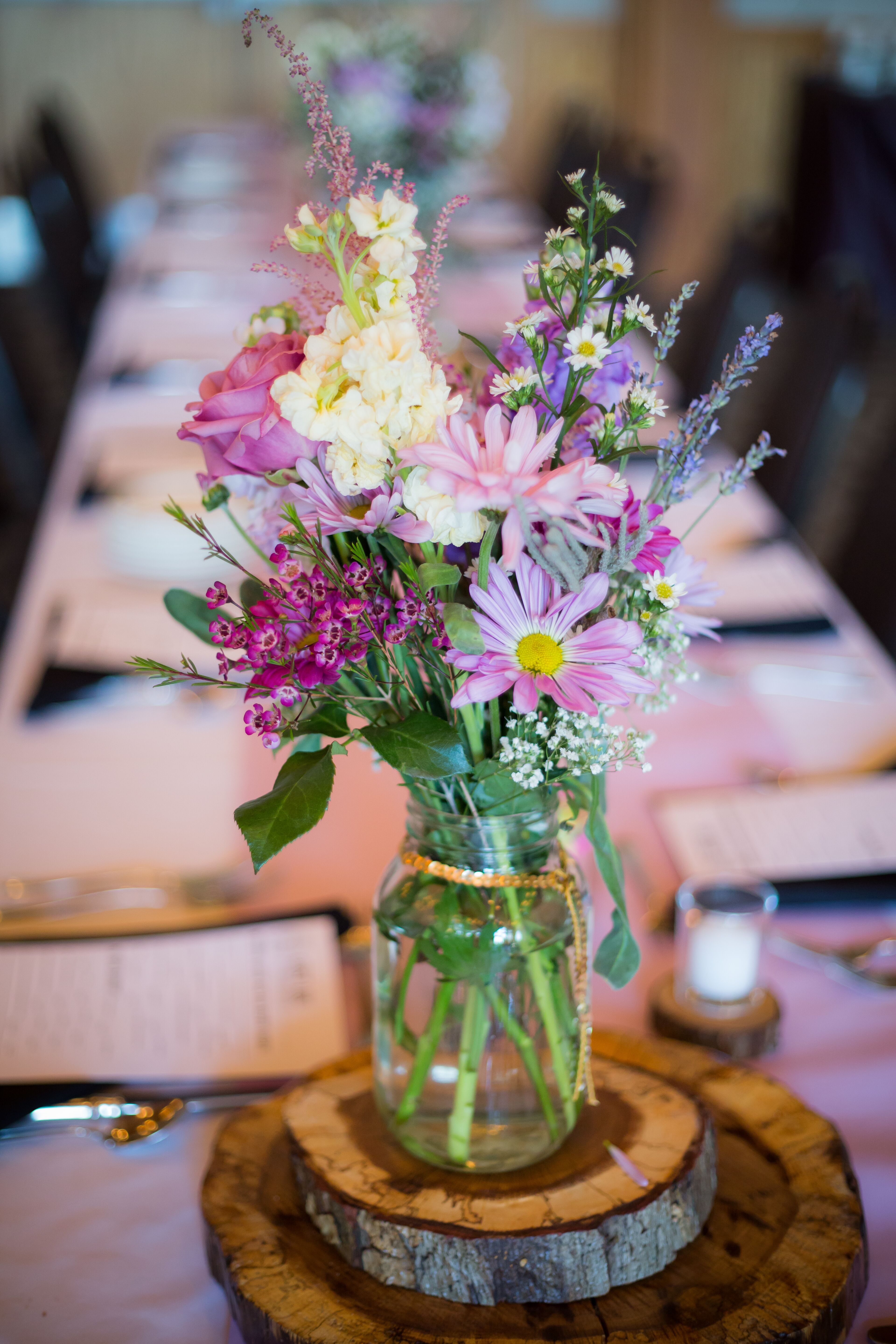 The Floral Table Arrangements at the Reception