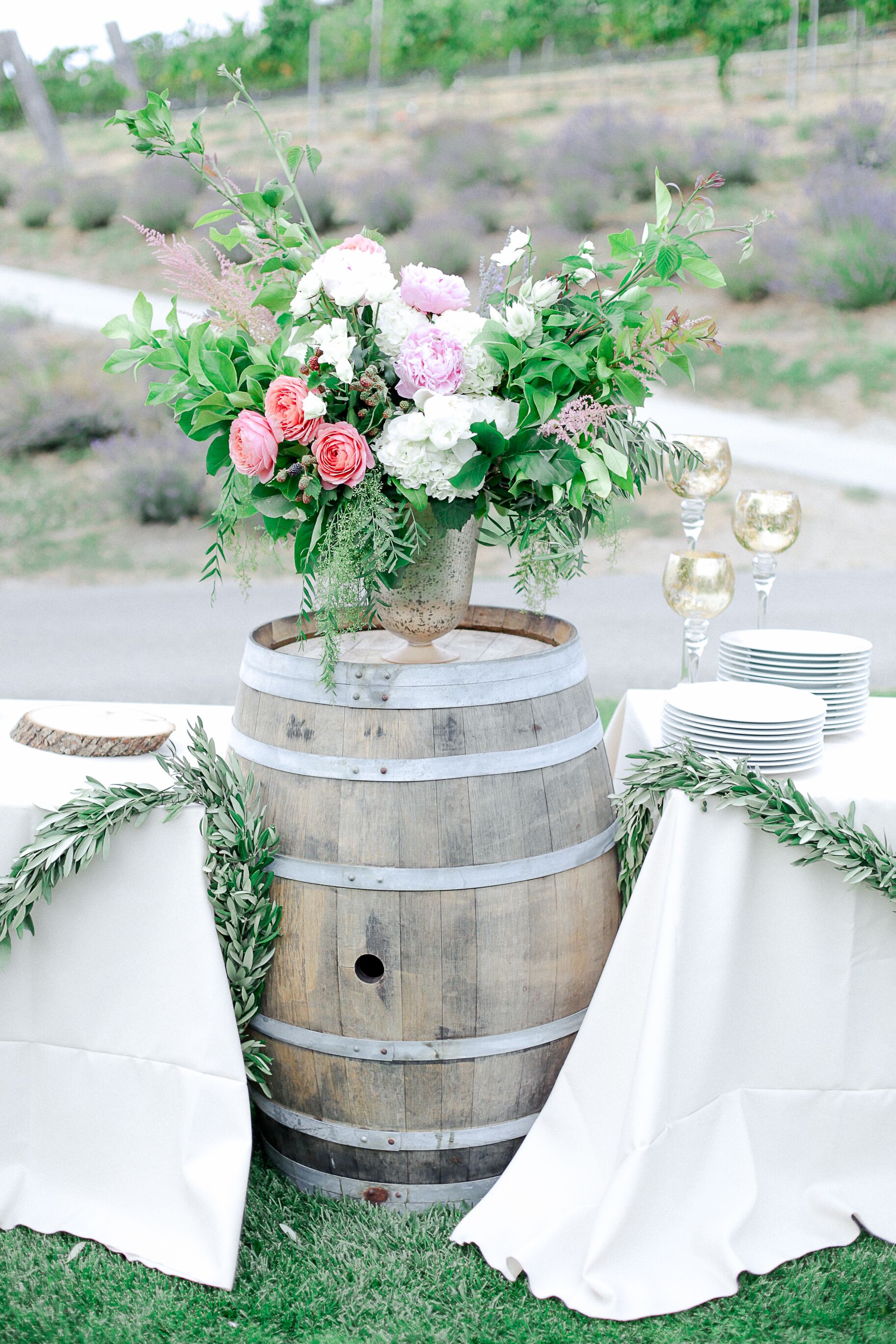 Wild Romantic Flower Arrangements on Barrel Pedestal