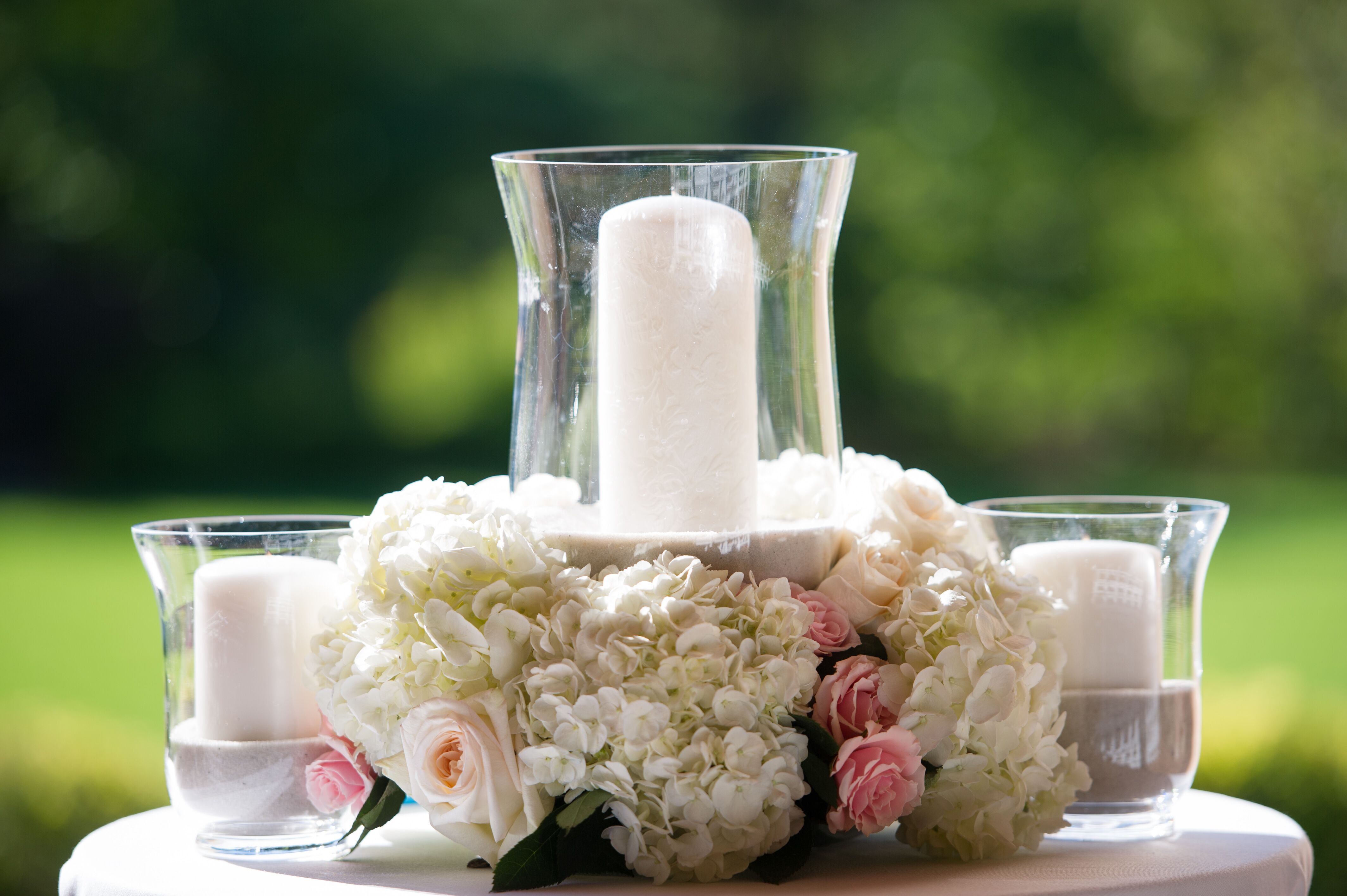 White Candles in Glass Votives