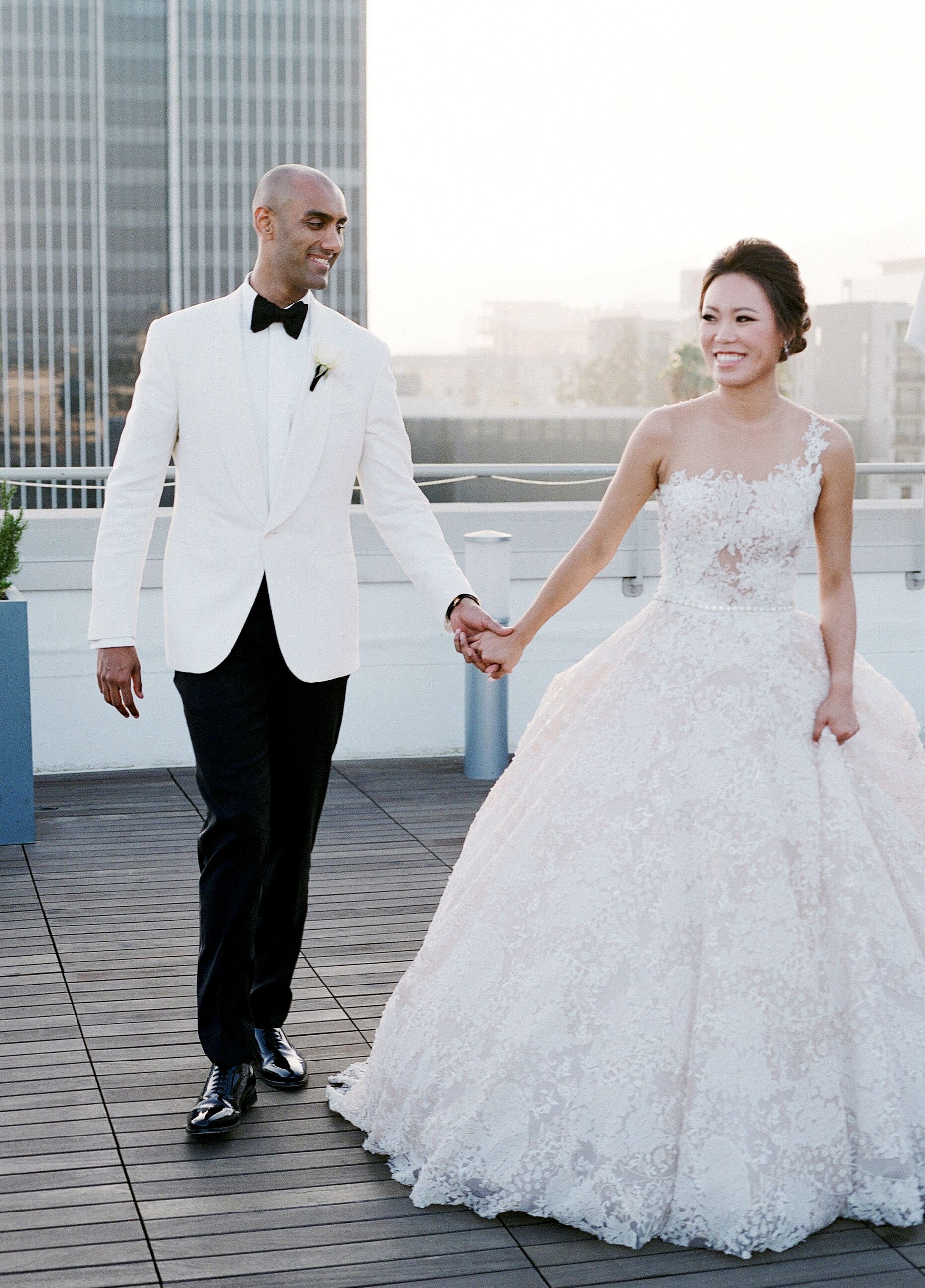 Formal Couple Wearing Ball Gown and White Tuxedo Jacket