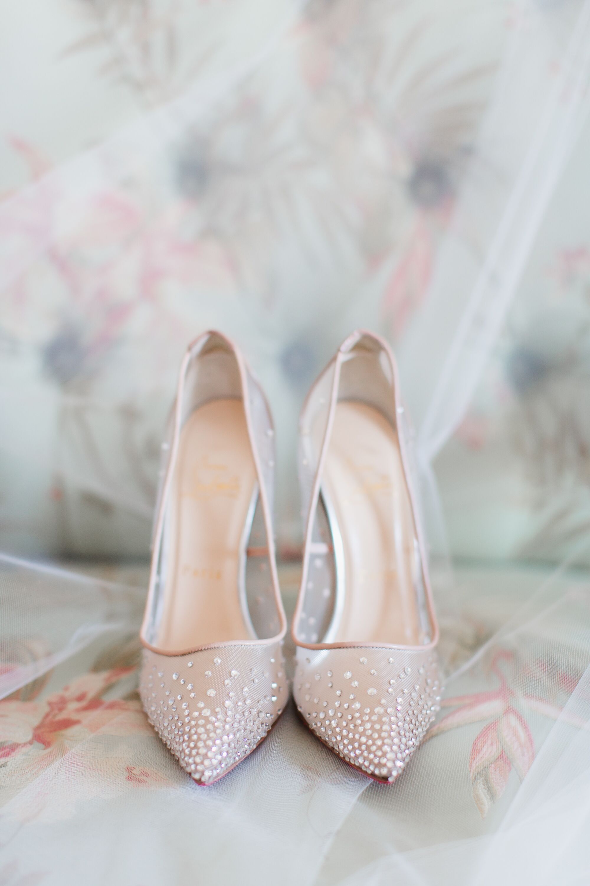 blue christian louboutin wedding heels shot with wedding rings