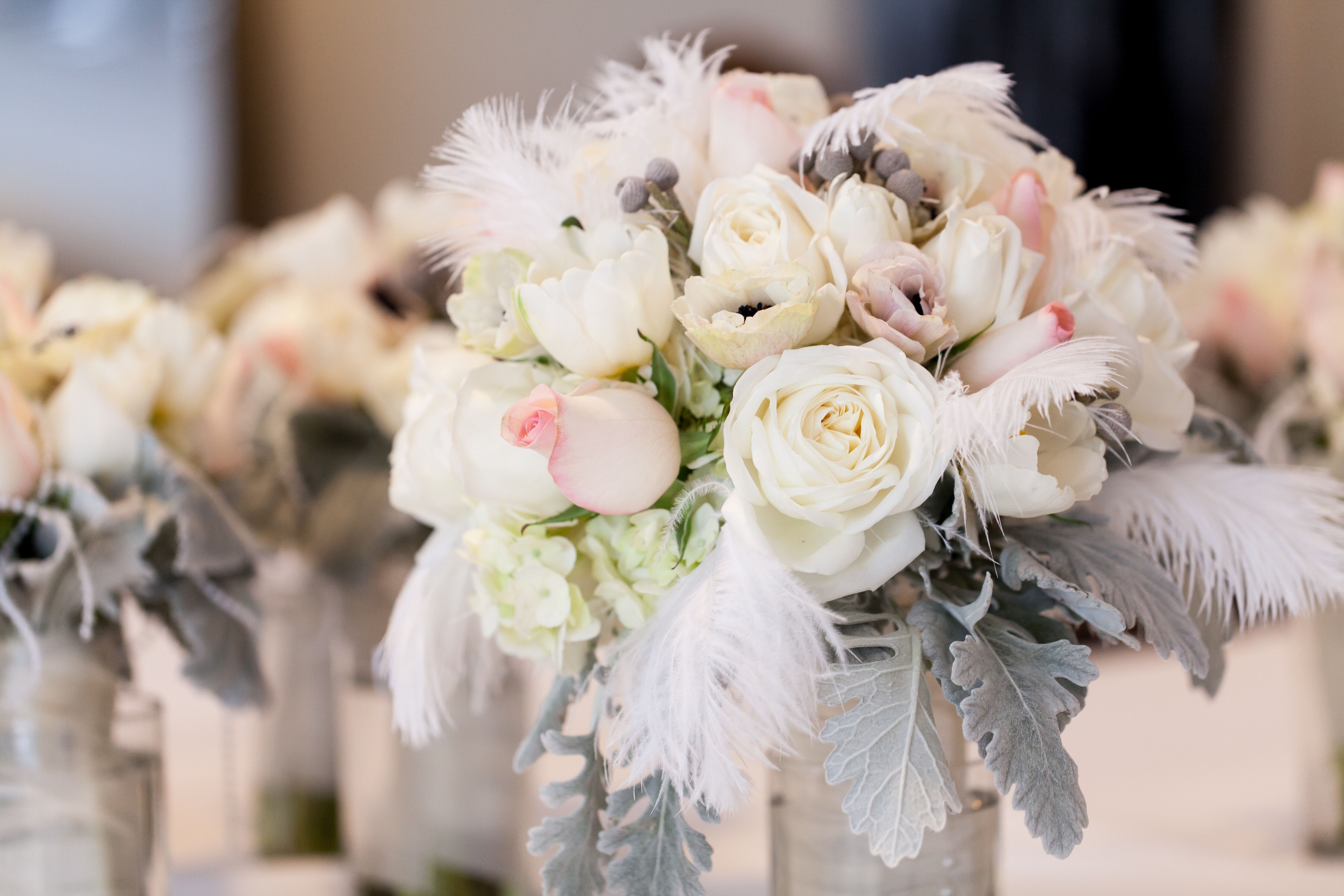 ostrich feather and flower centerpieces