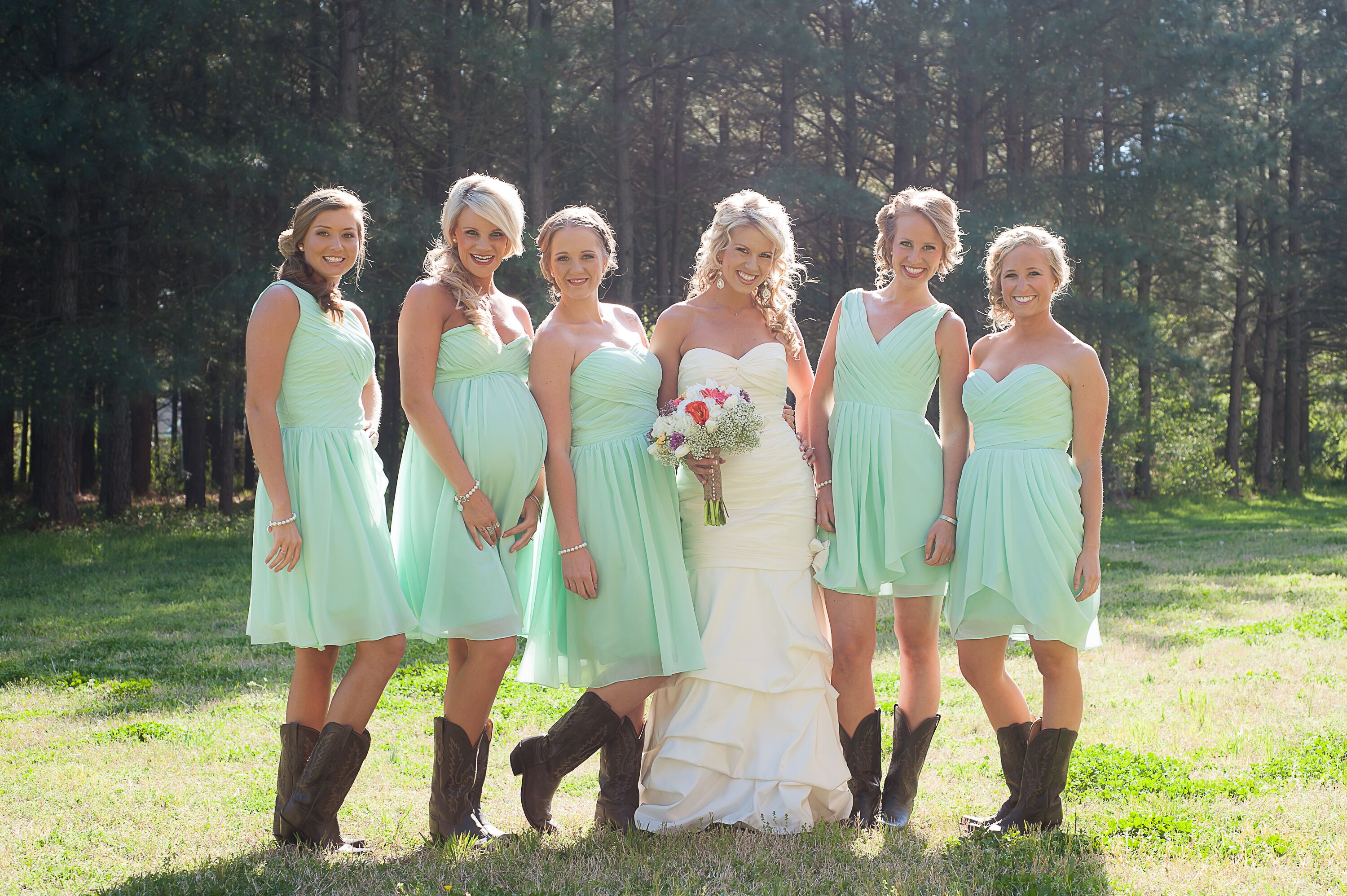 bridesmaids-in-mint-dresses-with-cowboy-boots