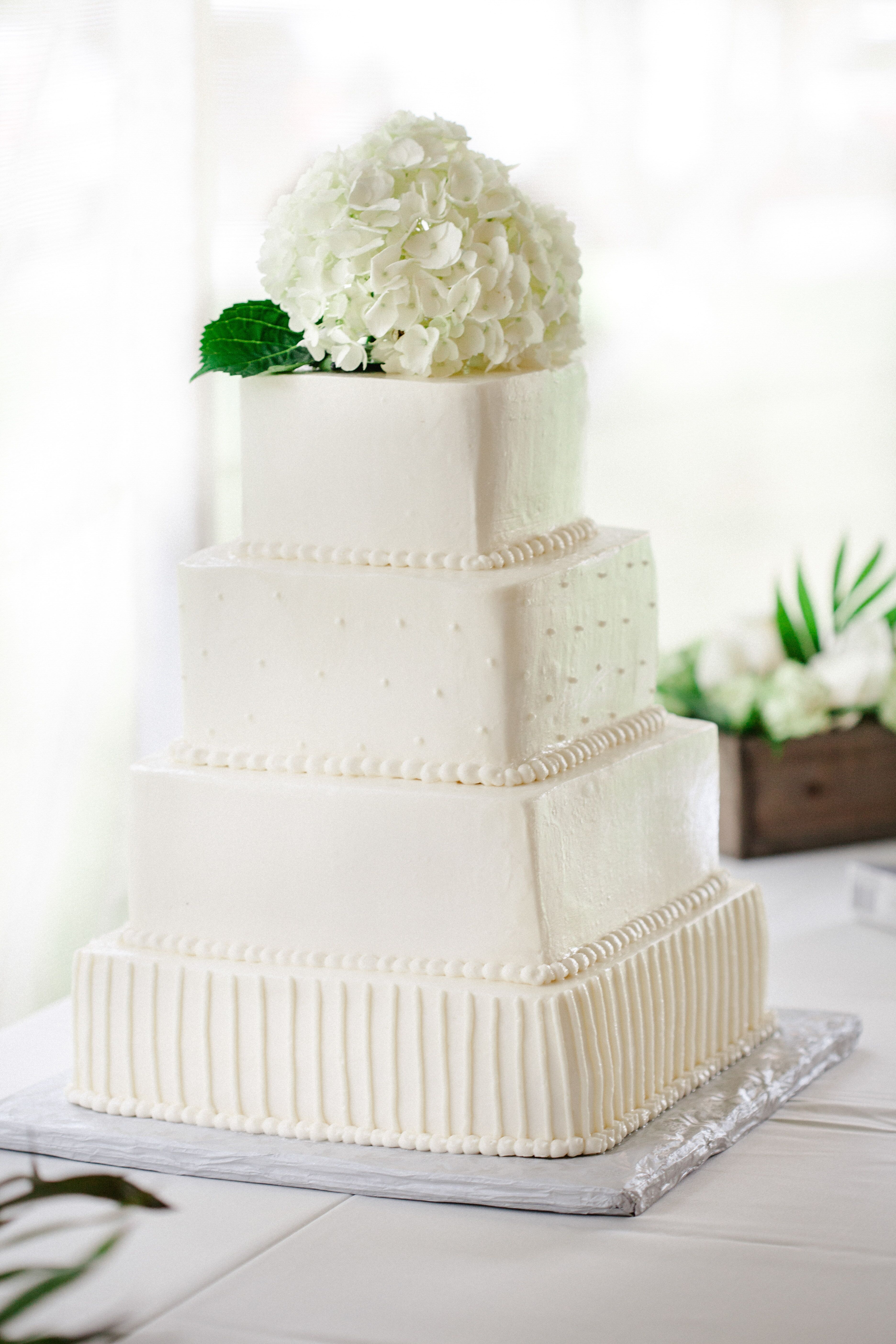 Simple White Four Square Tier Wedding Cake