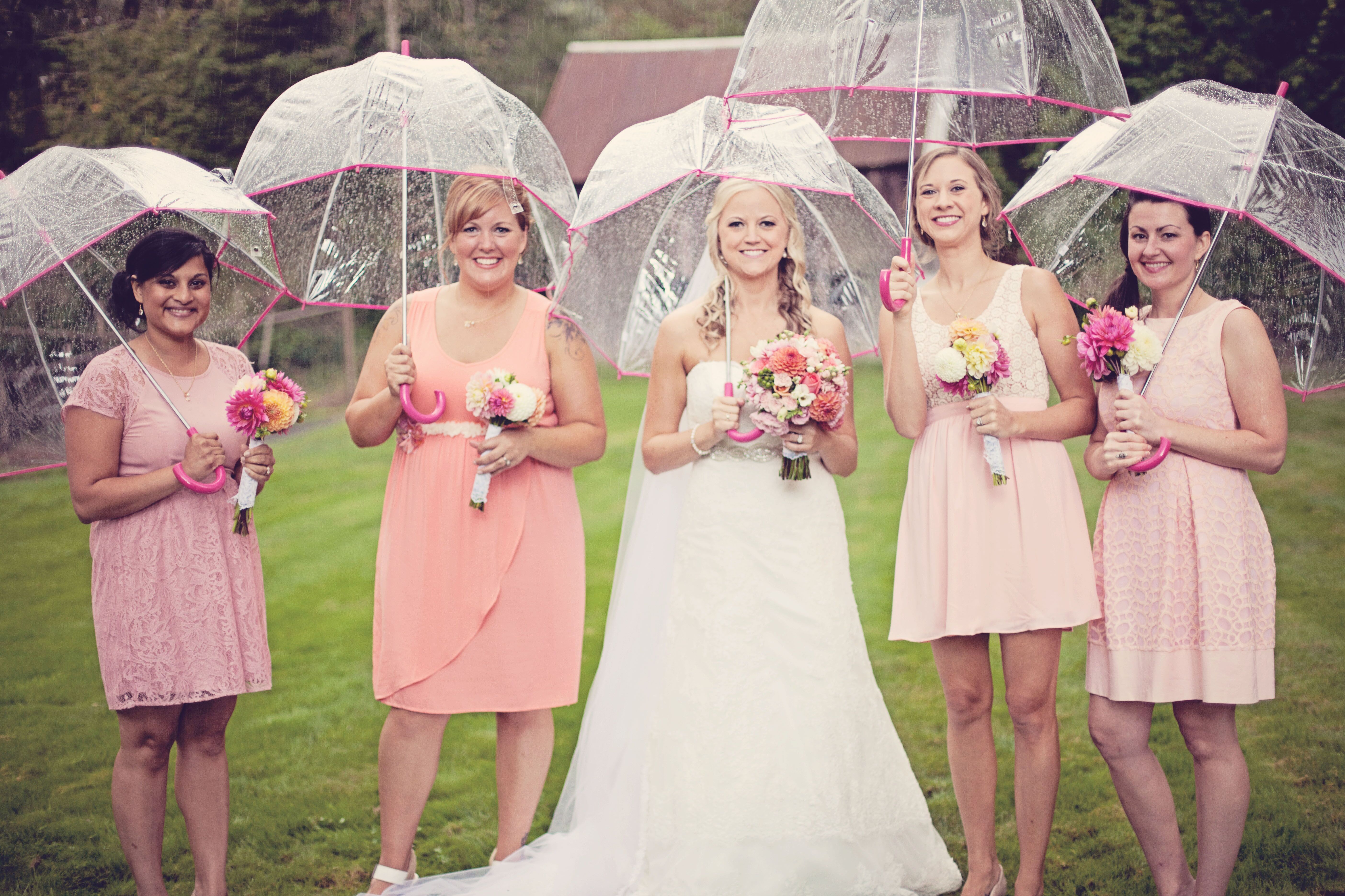 bridesmaids with umbrellas