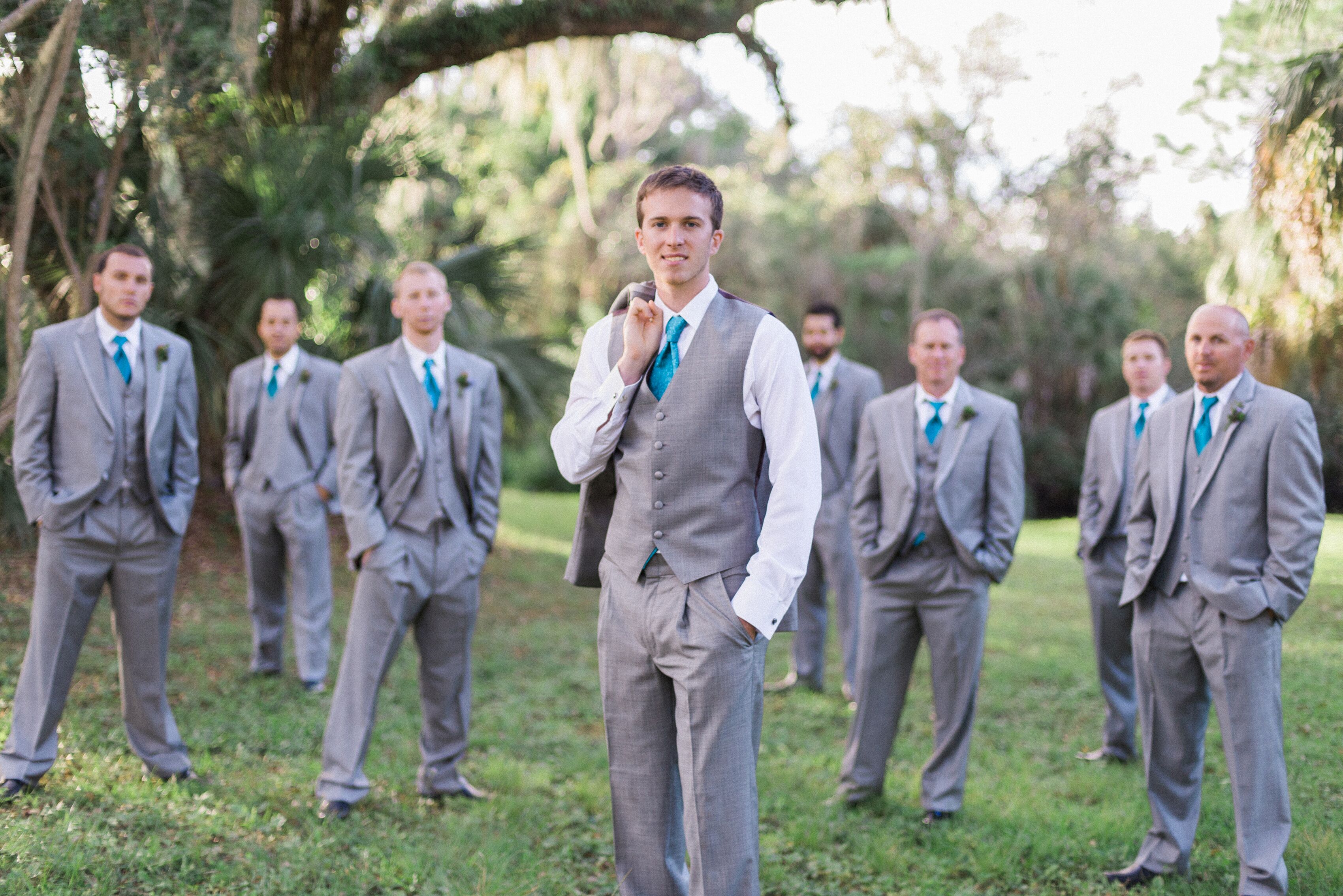 Gray Groomsmen Suits with Bright Turquoise Ties