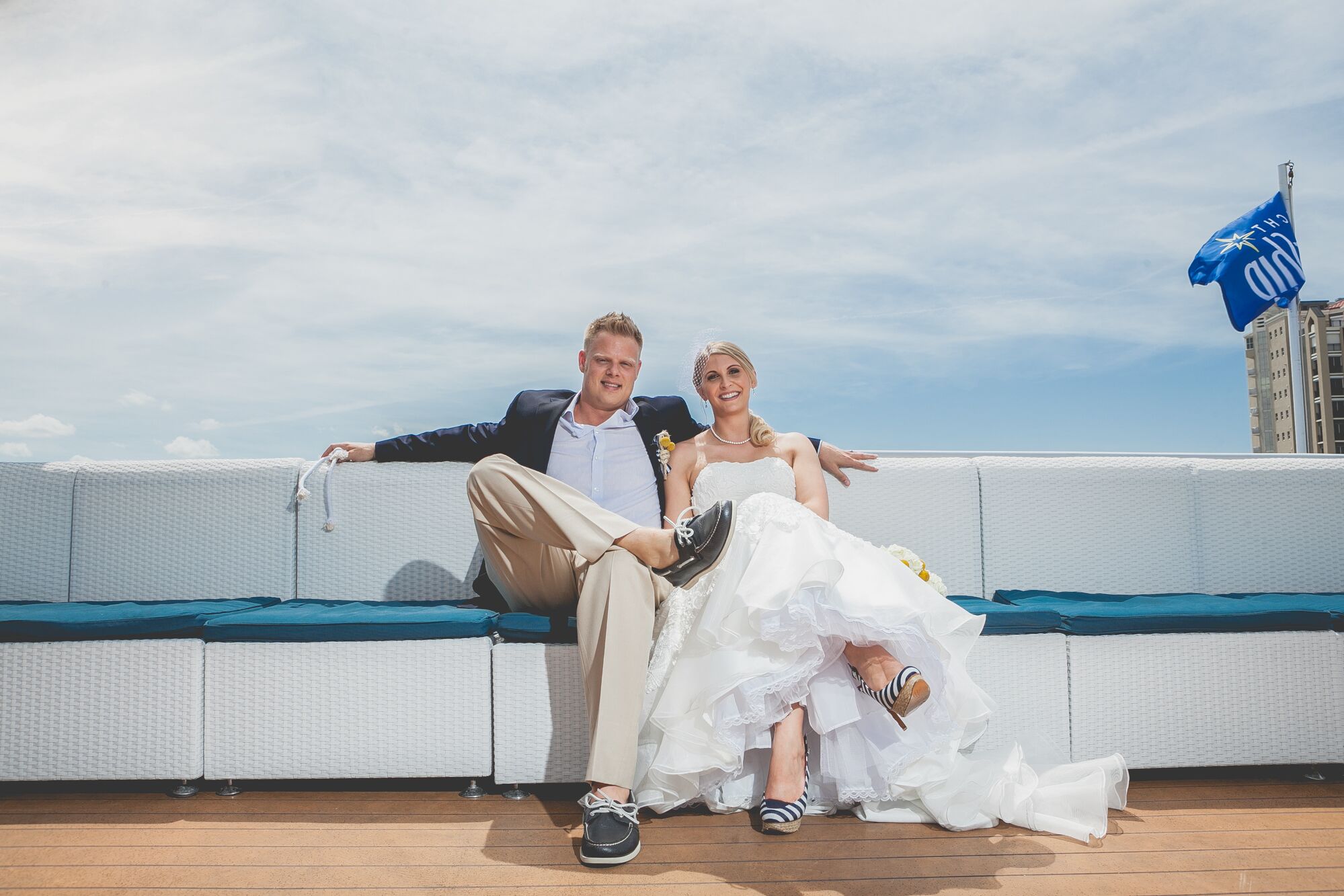 White Strapless Wedding Dress and Striped Shoes