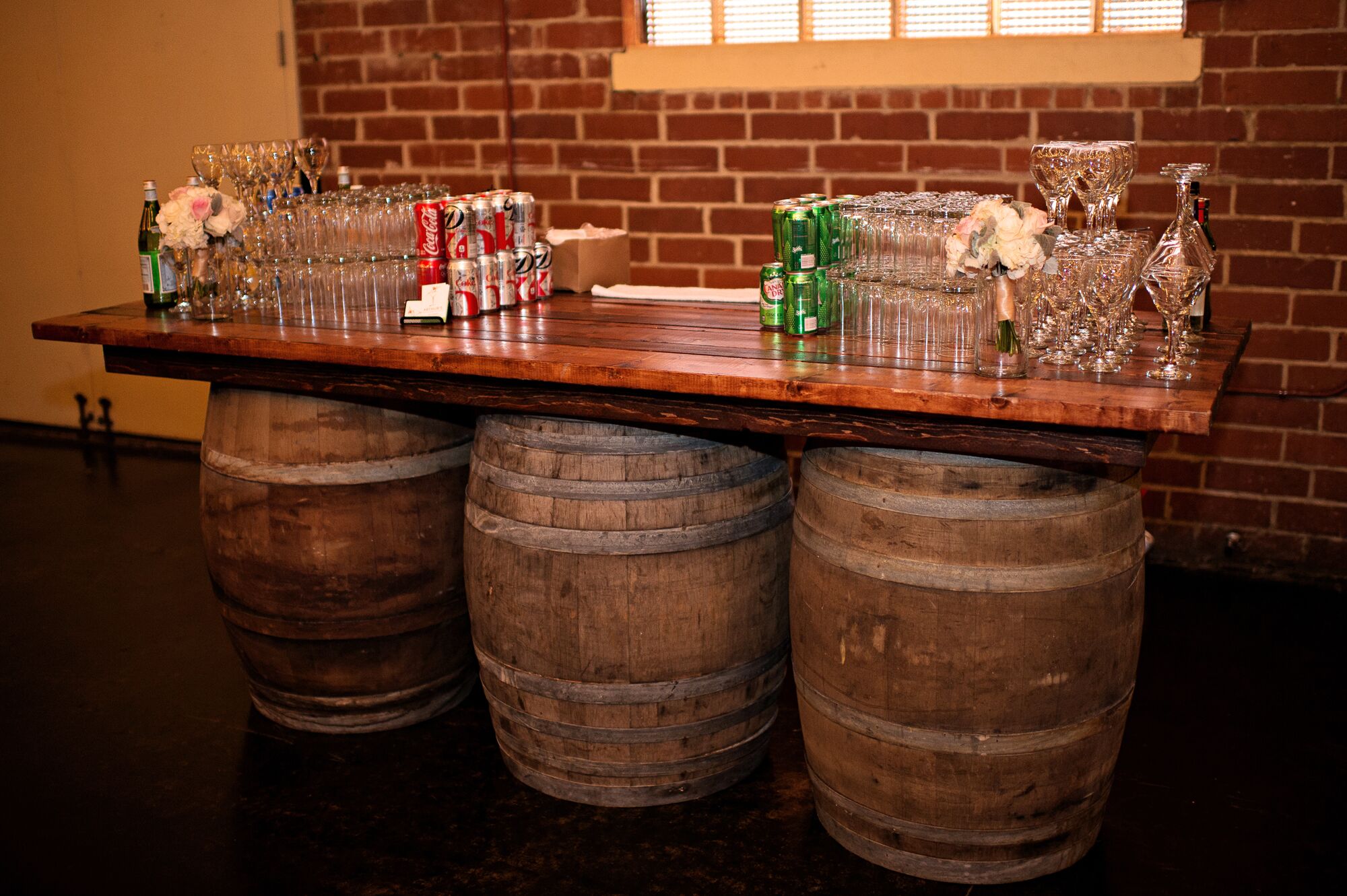 Rustic Drink Table Atop Three Wooden Barrels