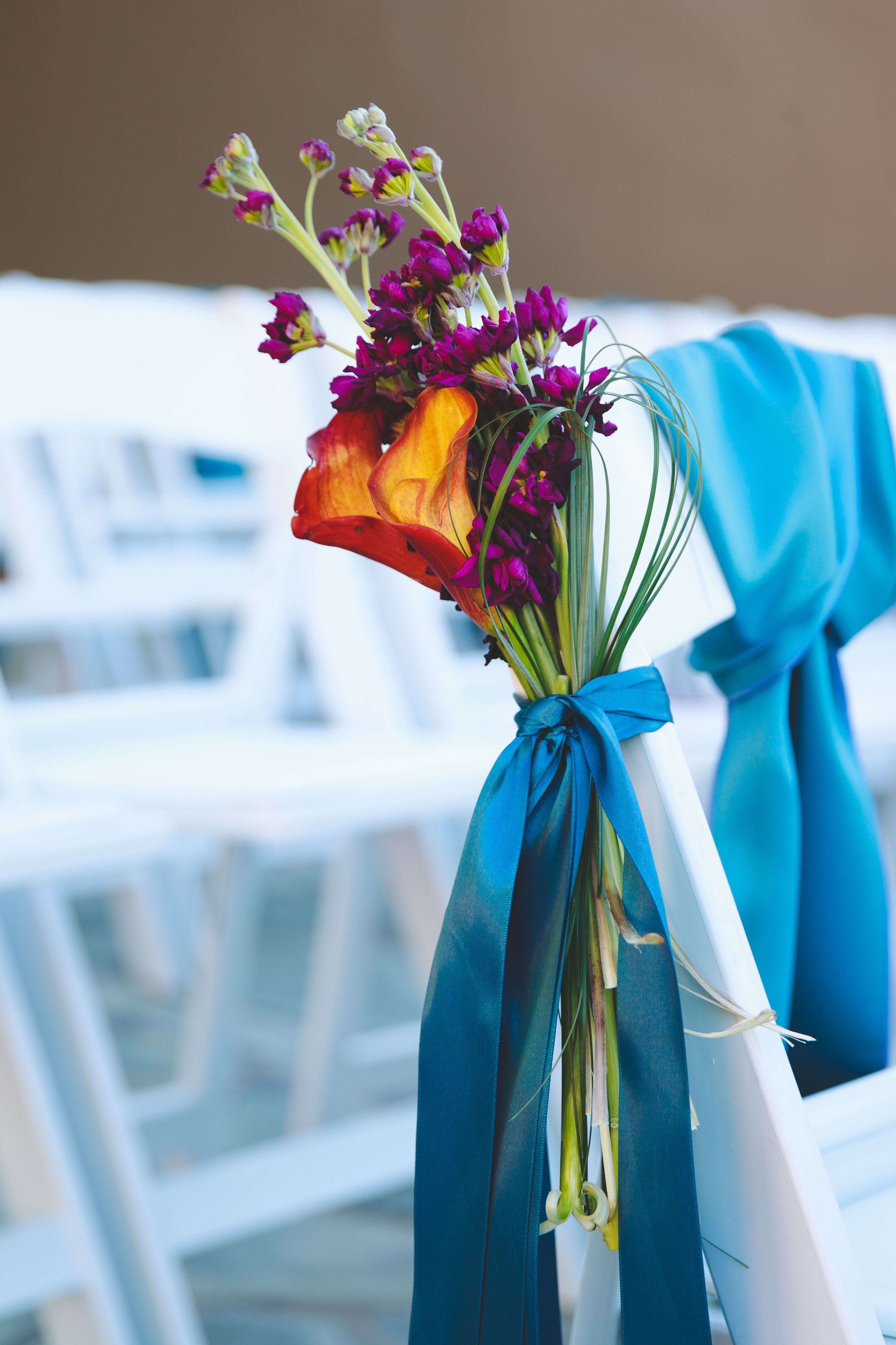 Orange, Purple and Turquoise Aisle Decorations