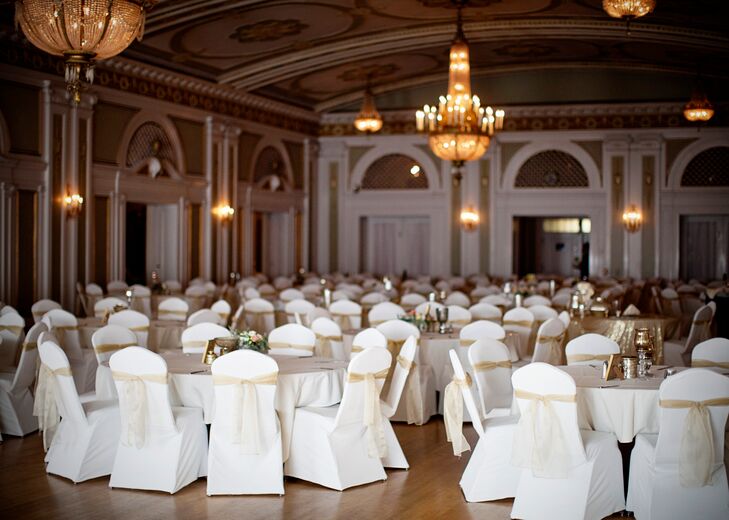 Ivory Covered Chairs with Champagne Sashes in Greysolon Ballroom Reception