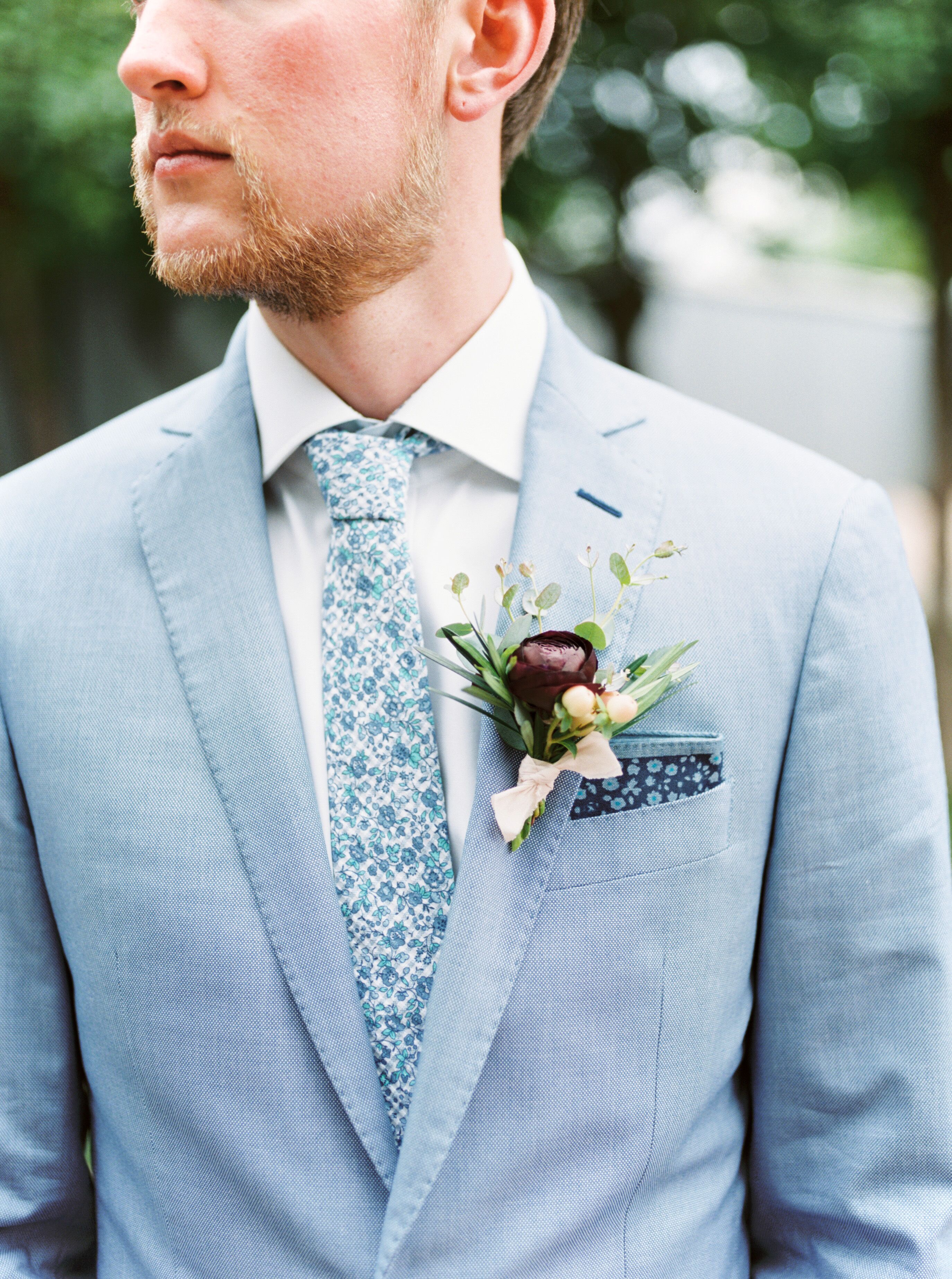 Groom in Pale Blue Suit with Floral Tie