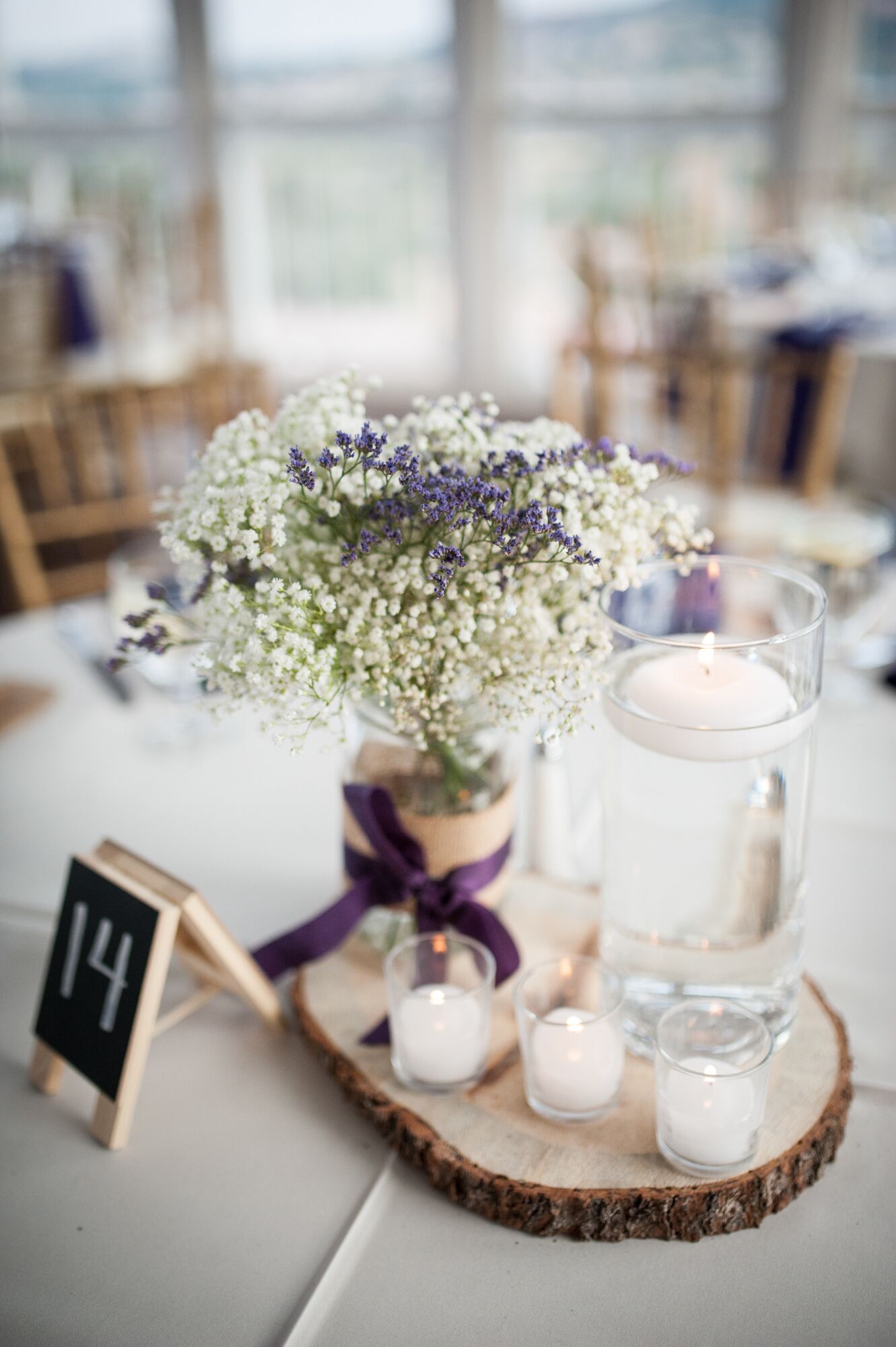 Rustic Baby's Breath and Floating Candle Centerpieces