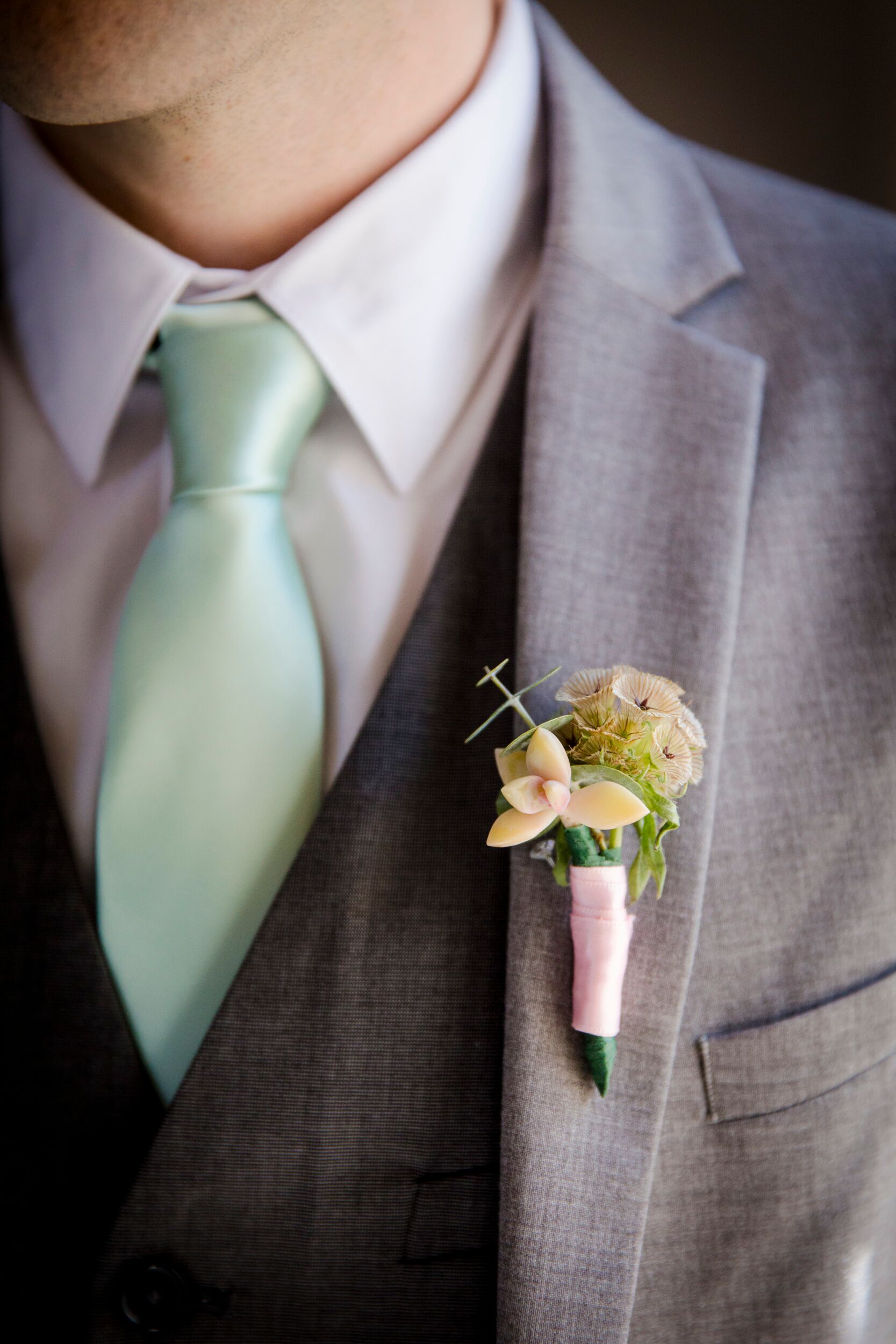 Groom Boutonniere And Mint Green Tie