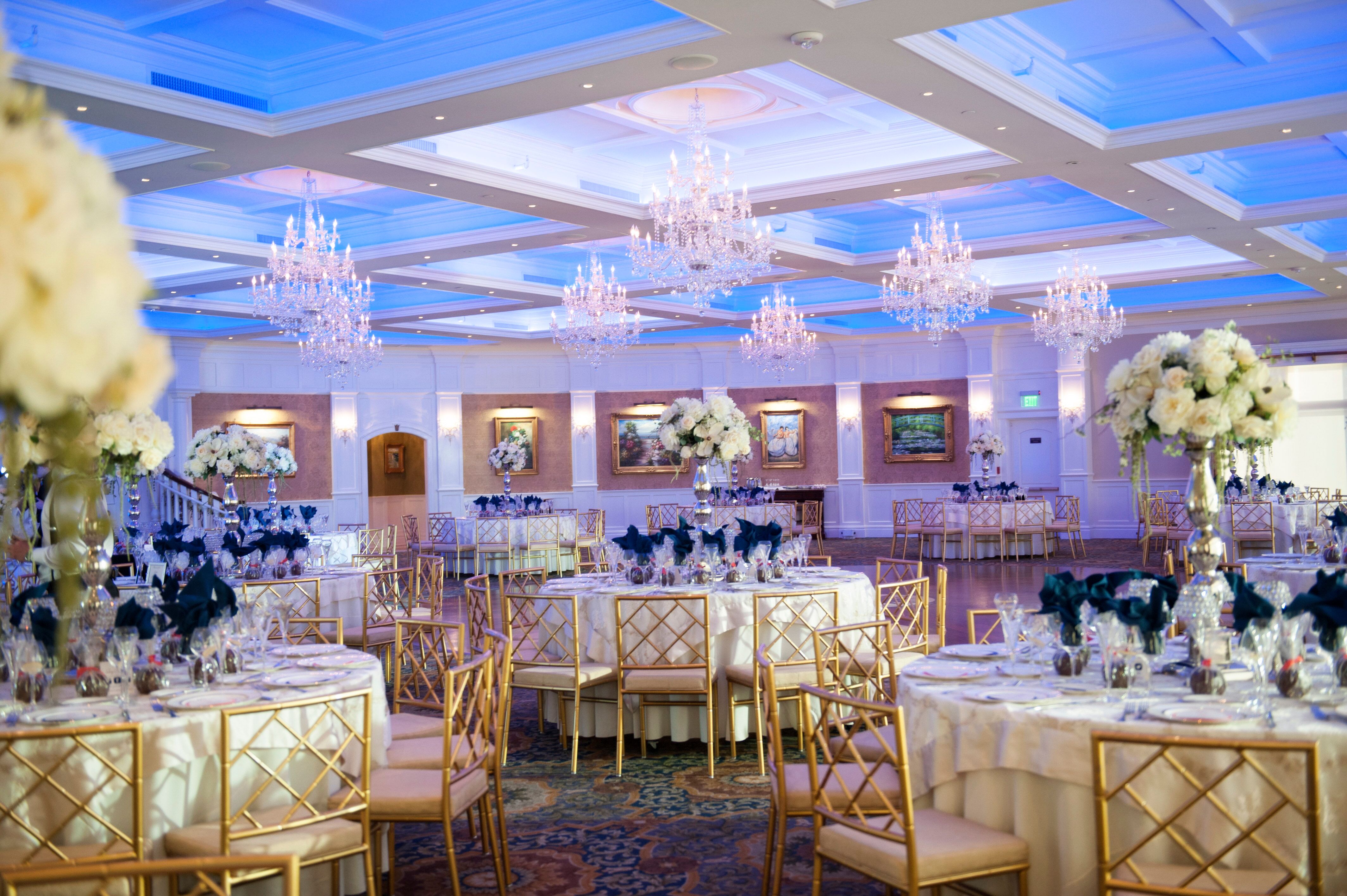 Blue and Gold Ballroom Reception with Chandeliers at Clark's Landing