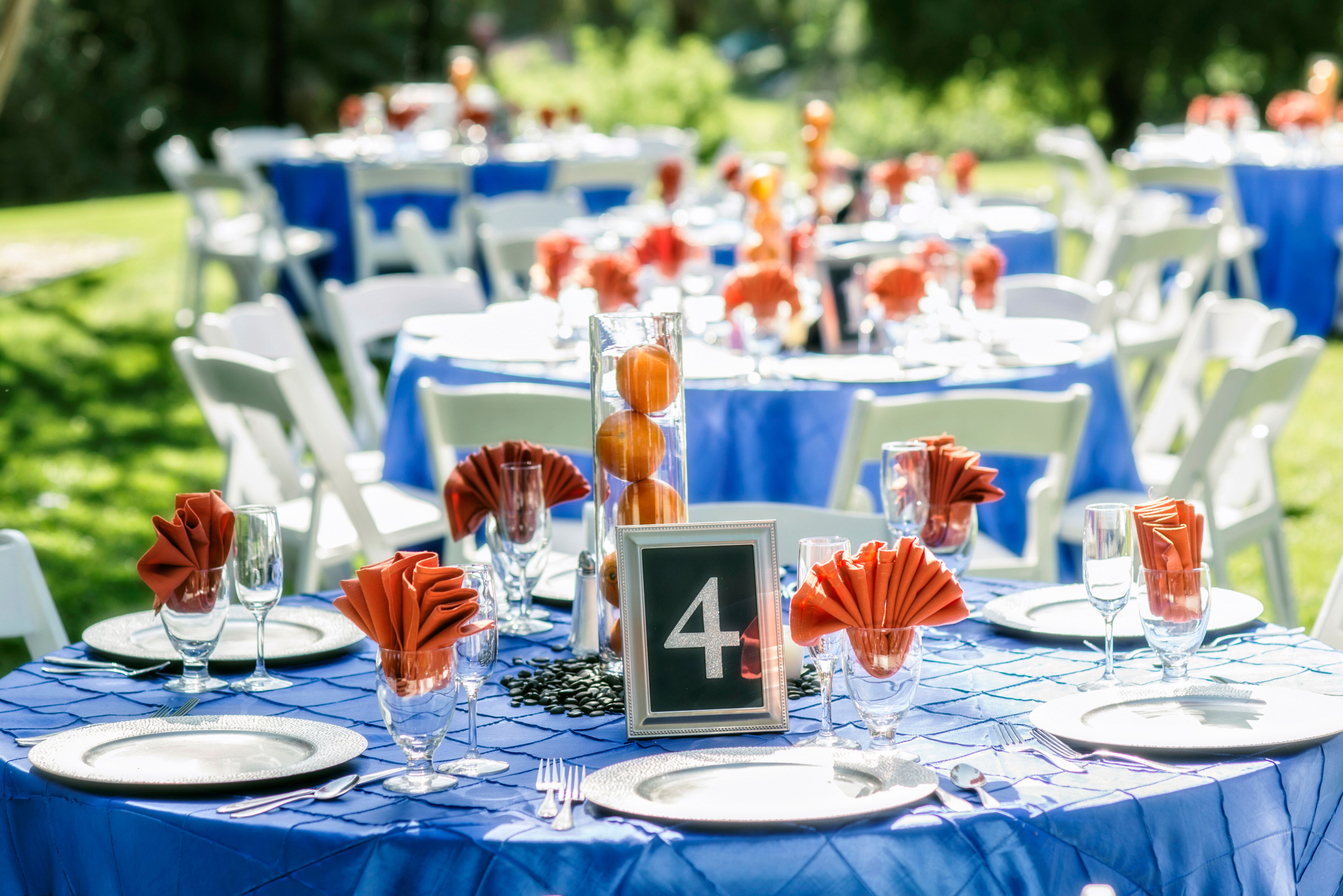 Blue Table Settings With Orange Accents