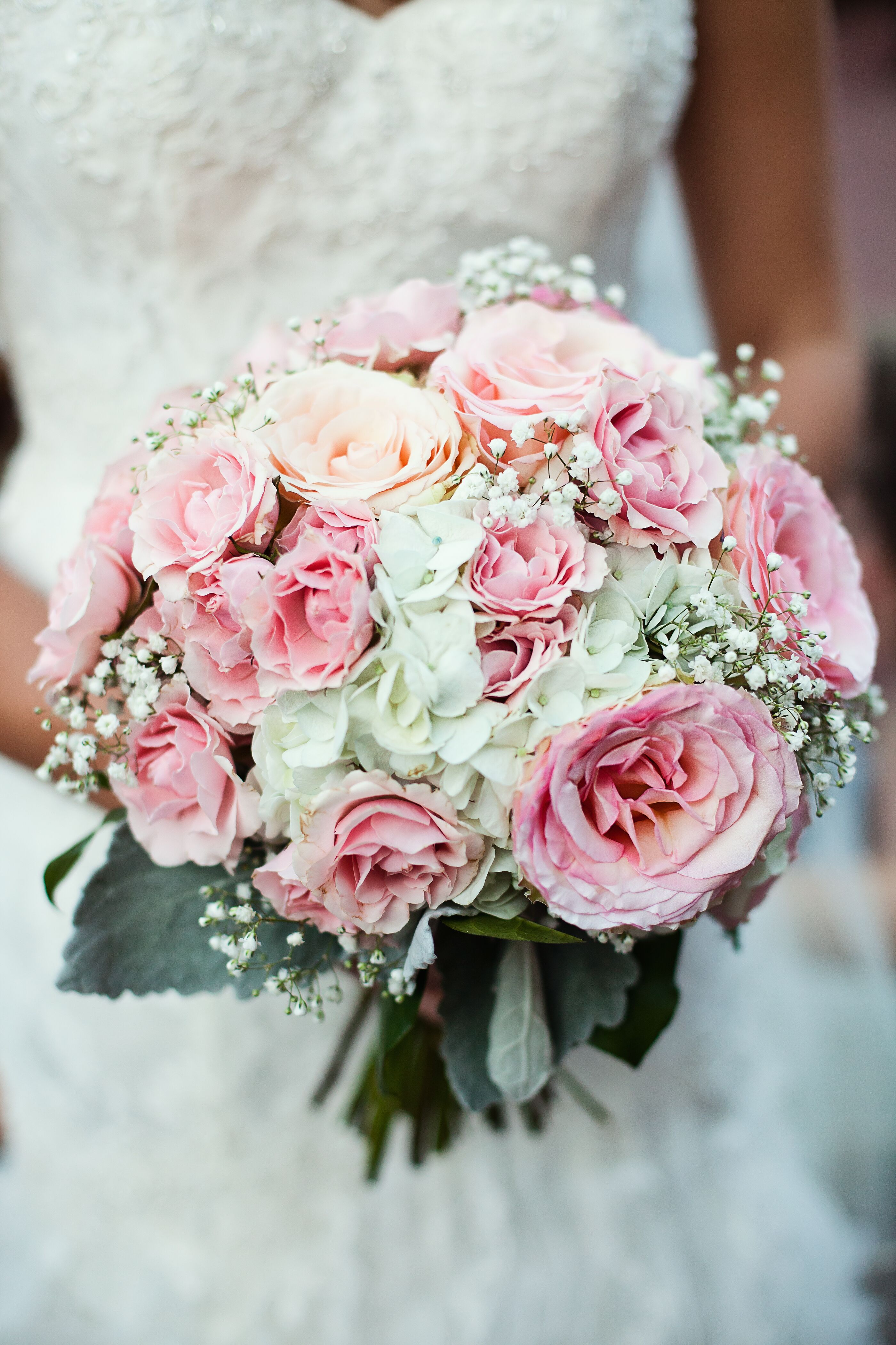 Image of Wedding bouquet made of white roses and pink hydrangeas