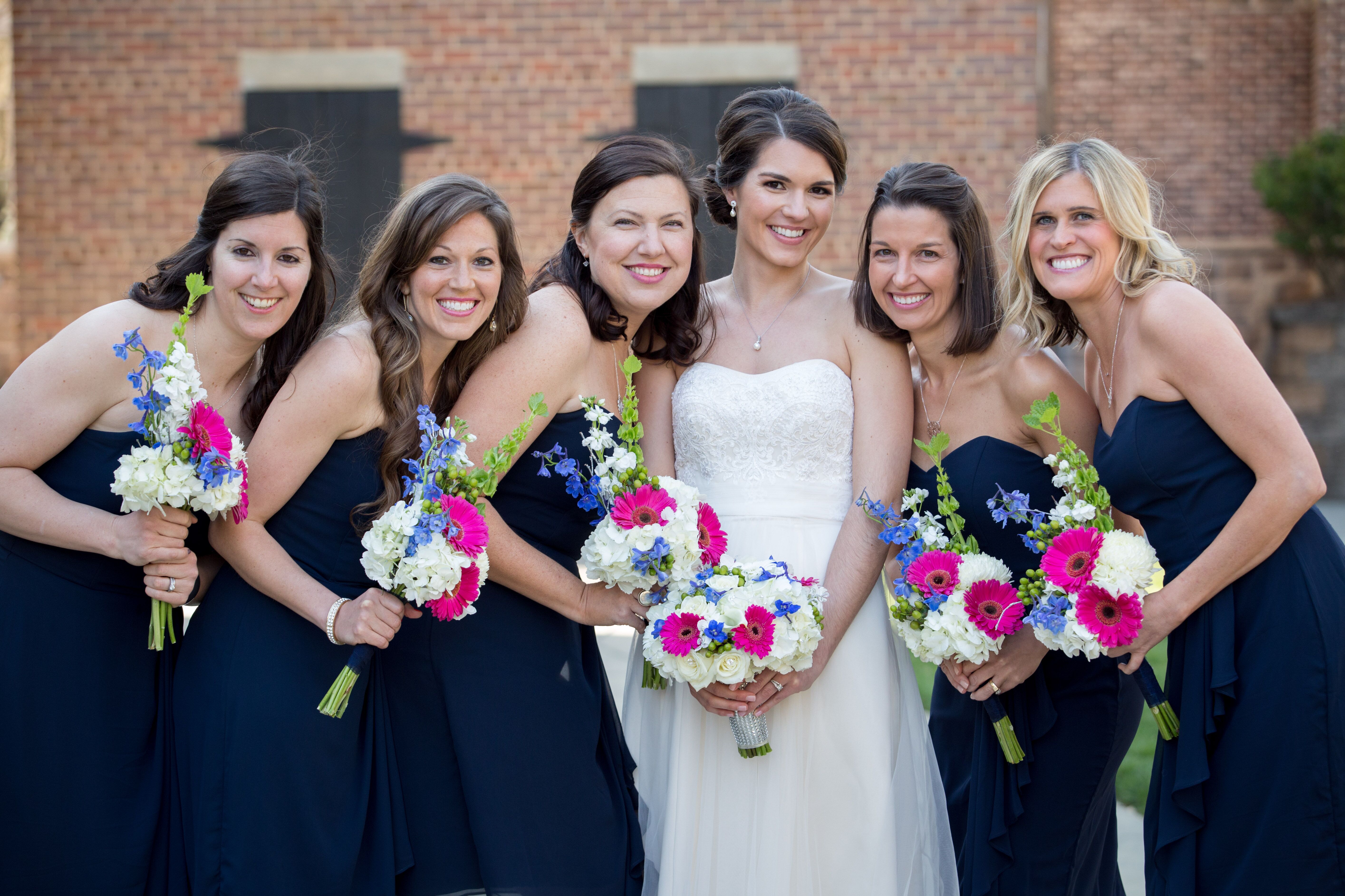 Navy Bridesmaid Dresses with Fuchsia and White Bouquets