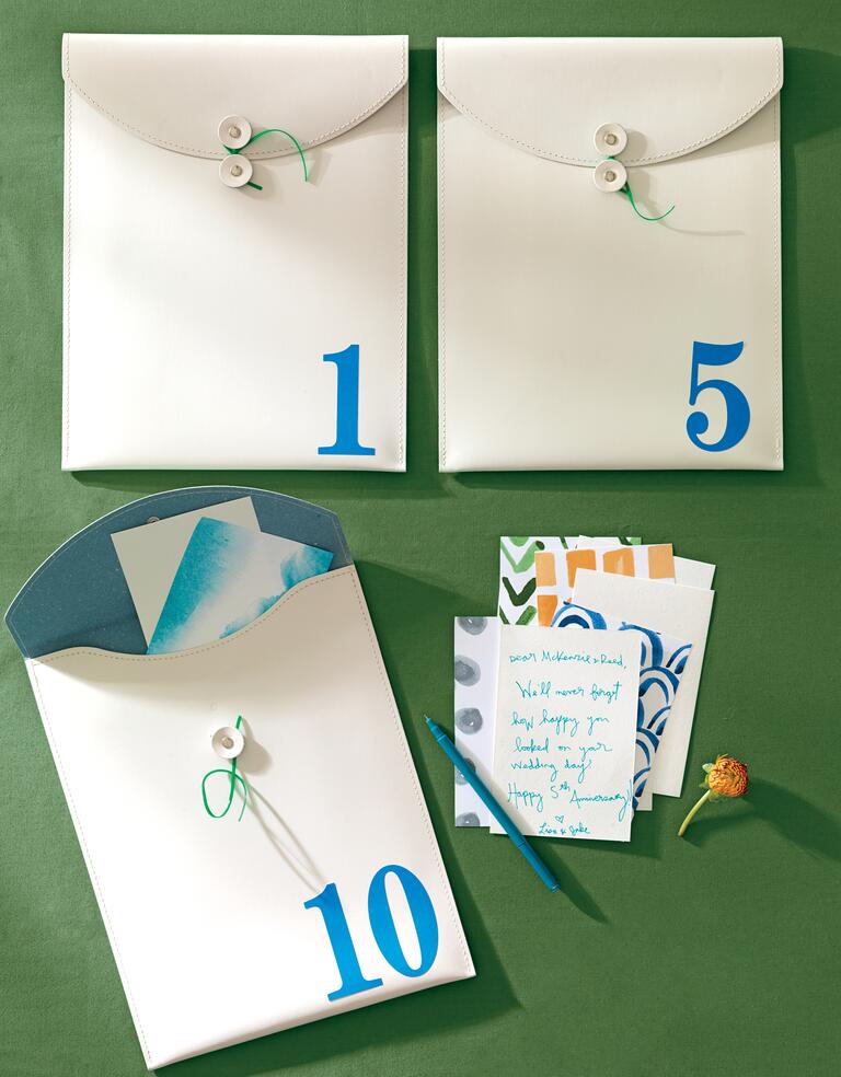 White envelopes for anniversary guest book notes