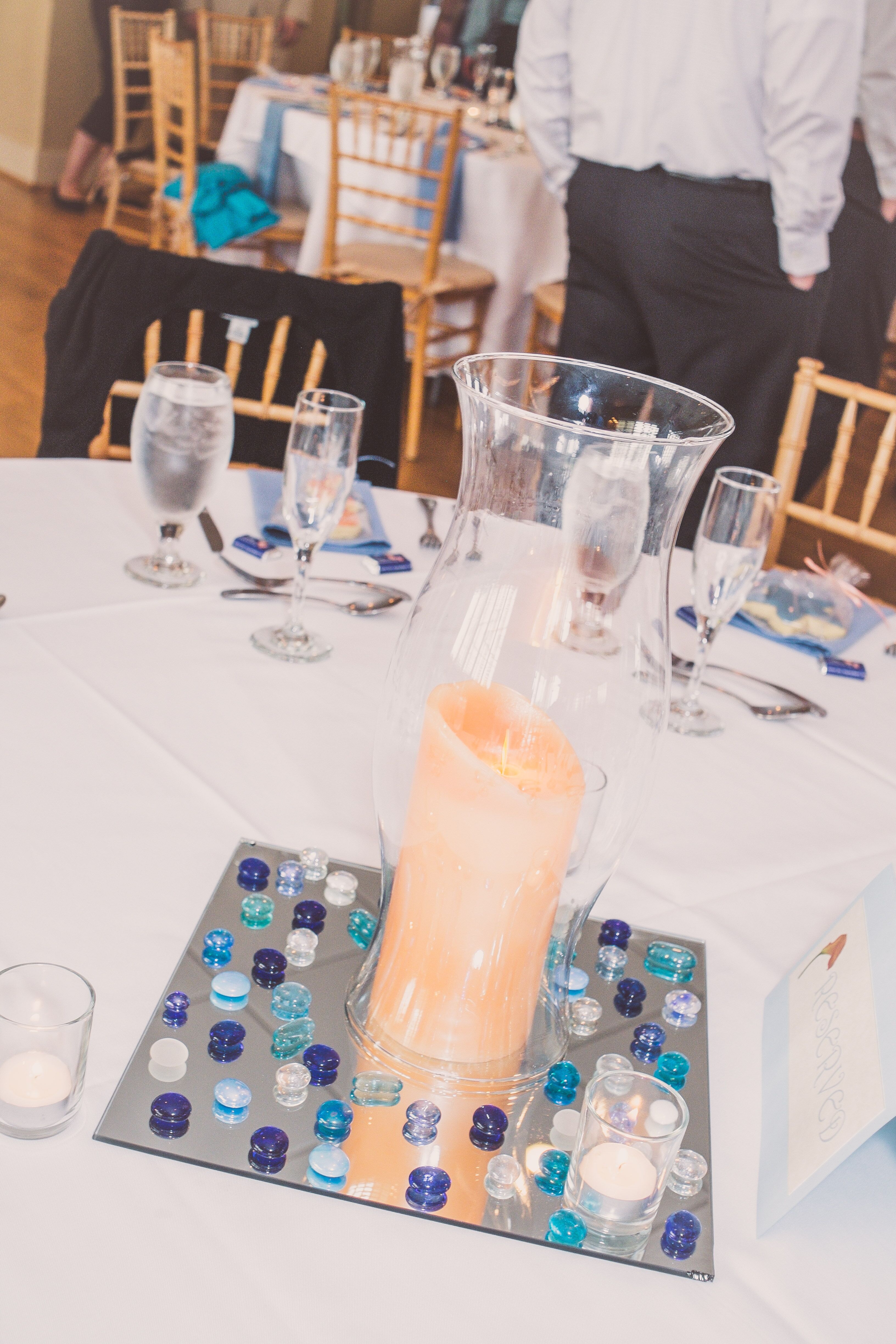 candle and vase centerpieces and blue glass pebbles photo context= vases photos&page=12