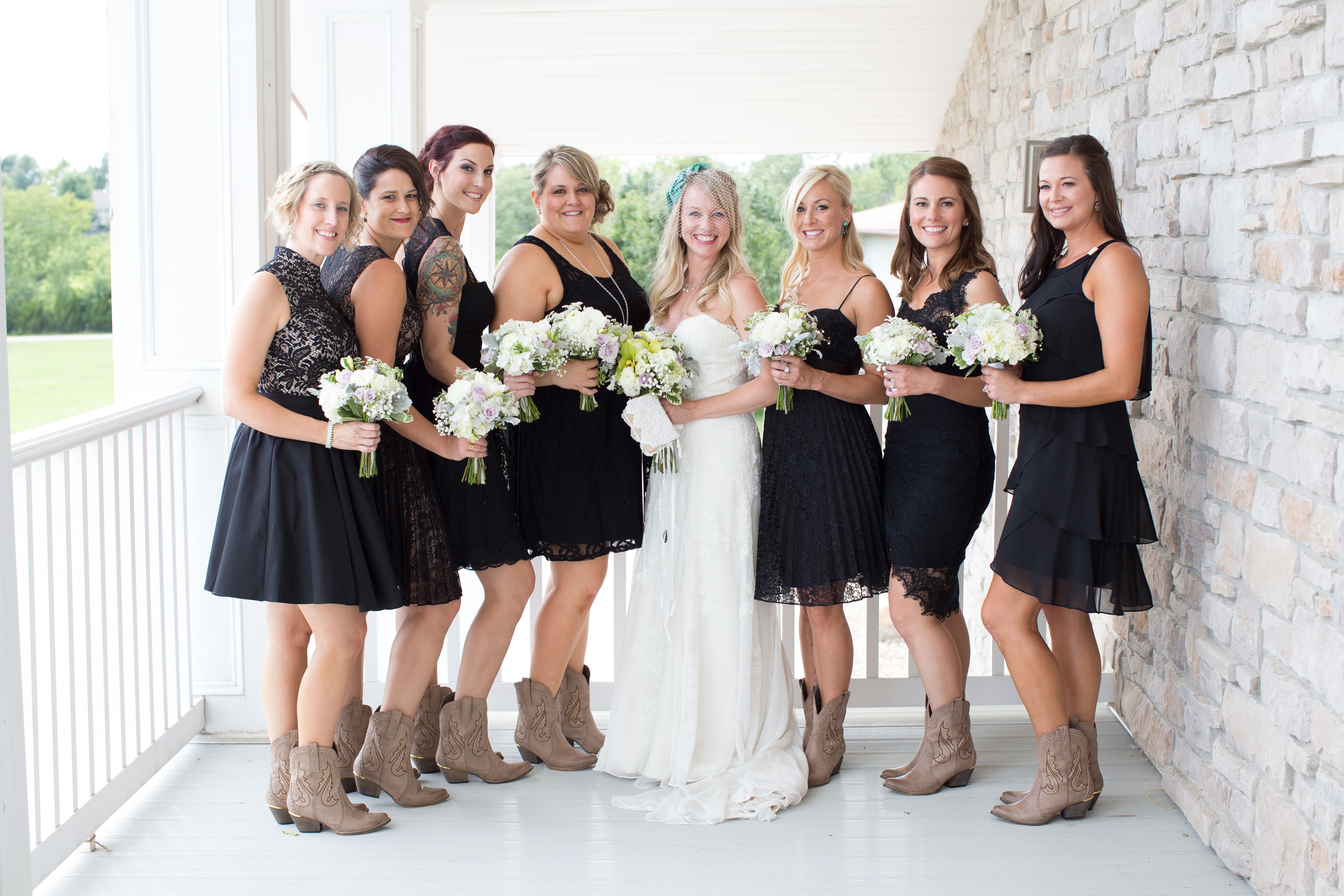 black lace dress with cowboy boots