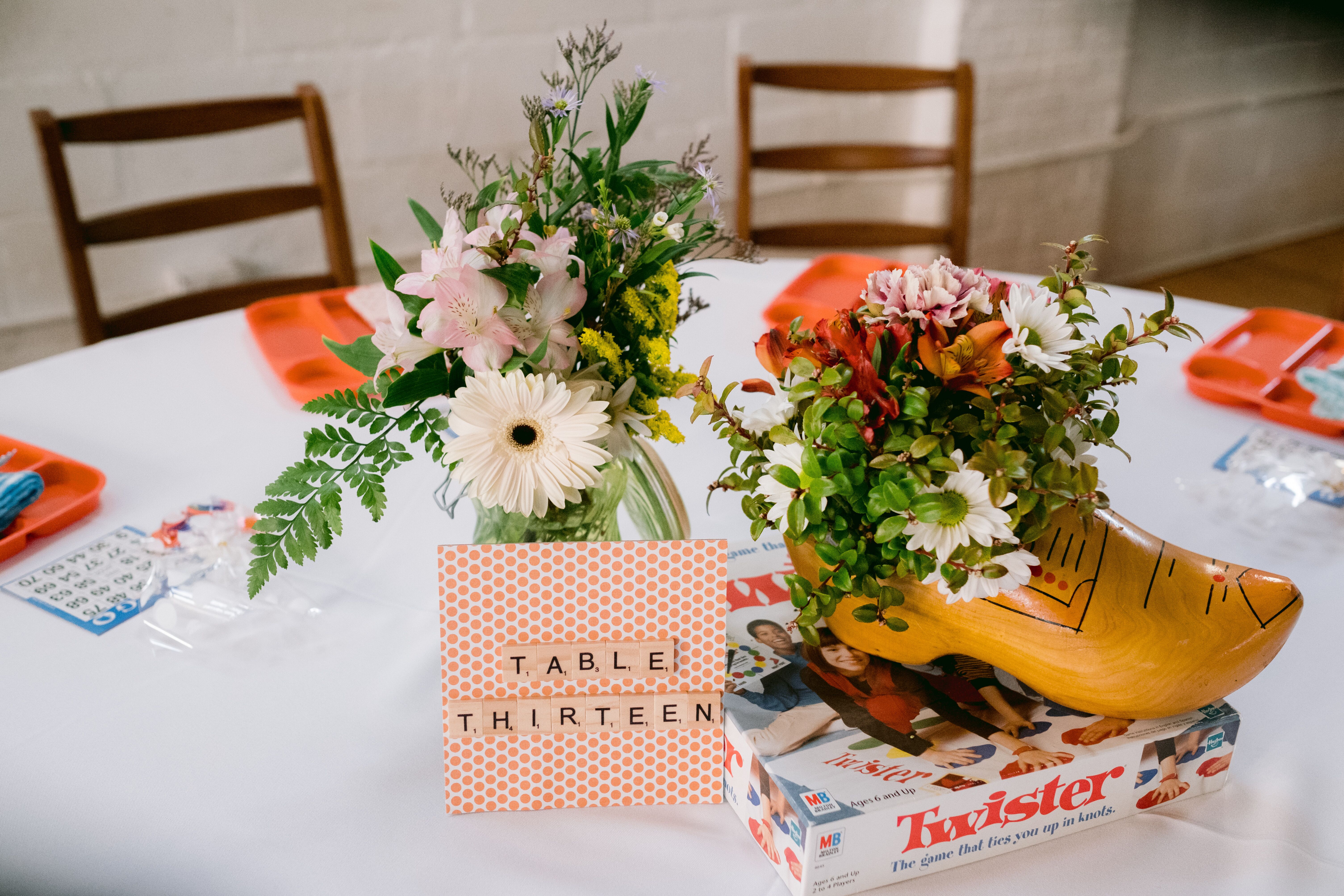 Board games used as table decorations  Board game wedding, Wedding  centerpieces, Wedding games