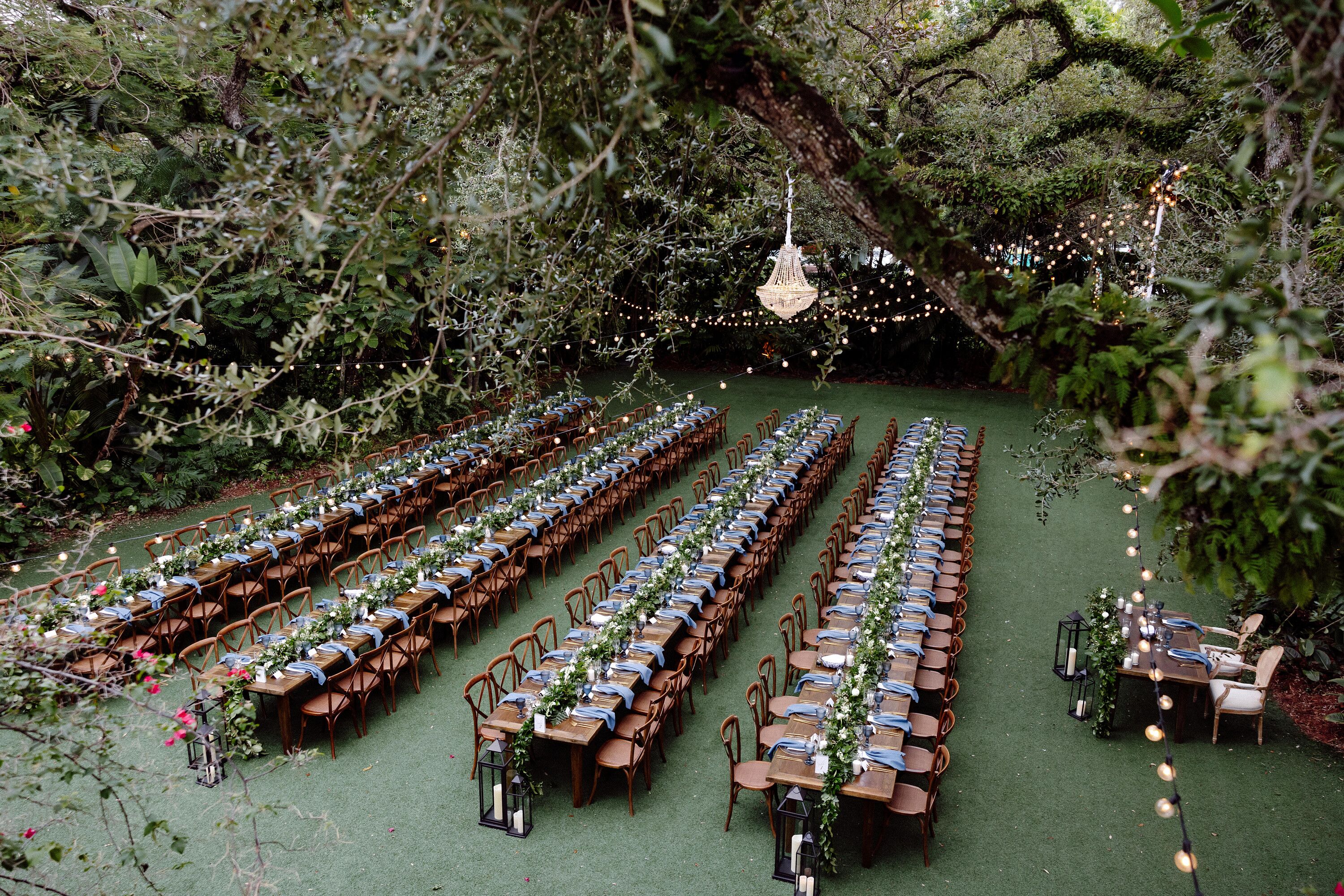 Long Wood Farm Tables at Reception at Villa Woodbine in Miami, Florida