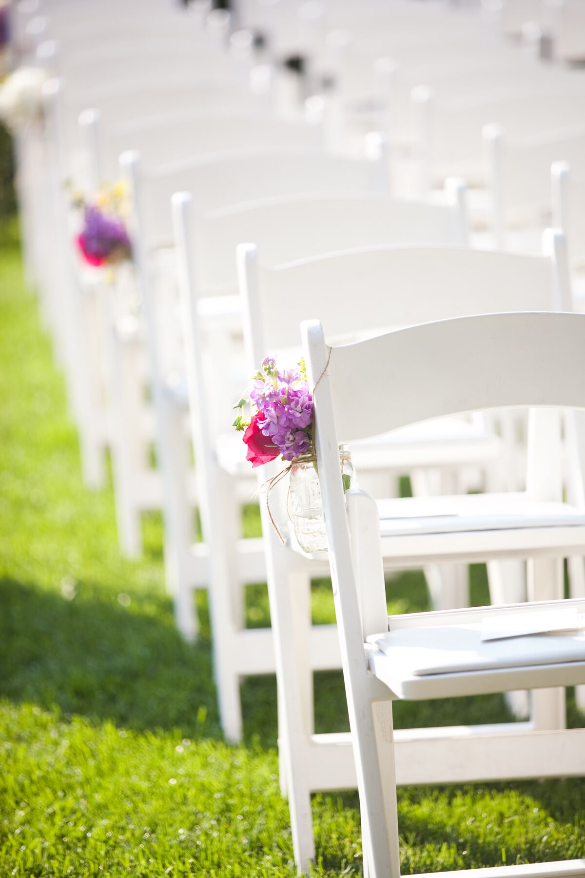 Ceremony White Folding Chairs   28e0bdf8 124d 11e4 843f 22000aa61a3e