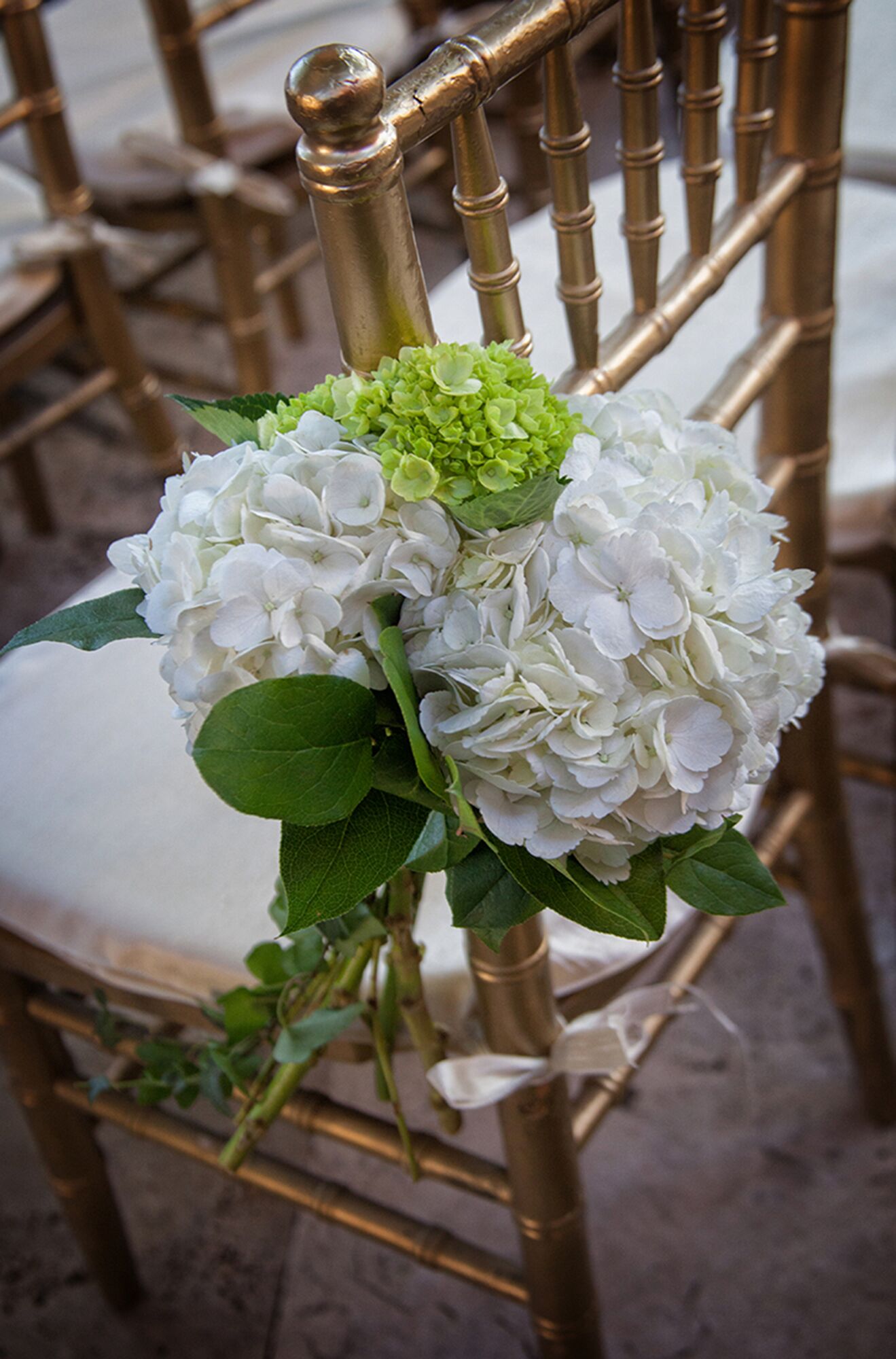 Green, White Hydrangea Ceremony Chair Decorations