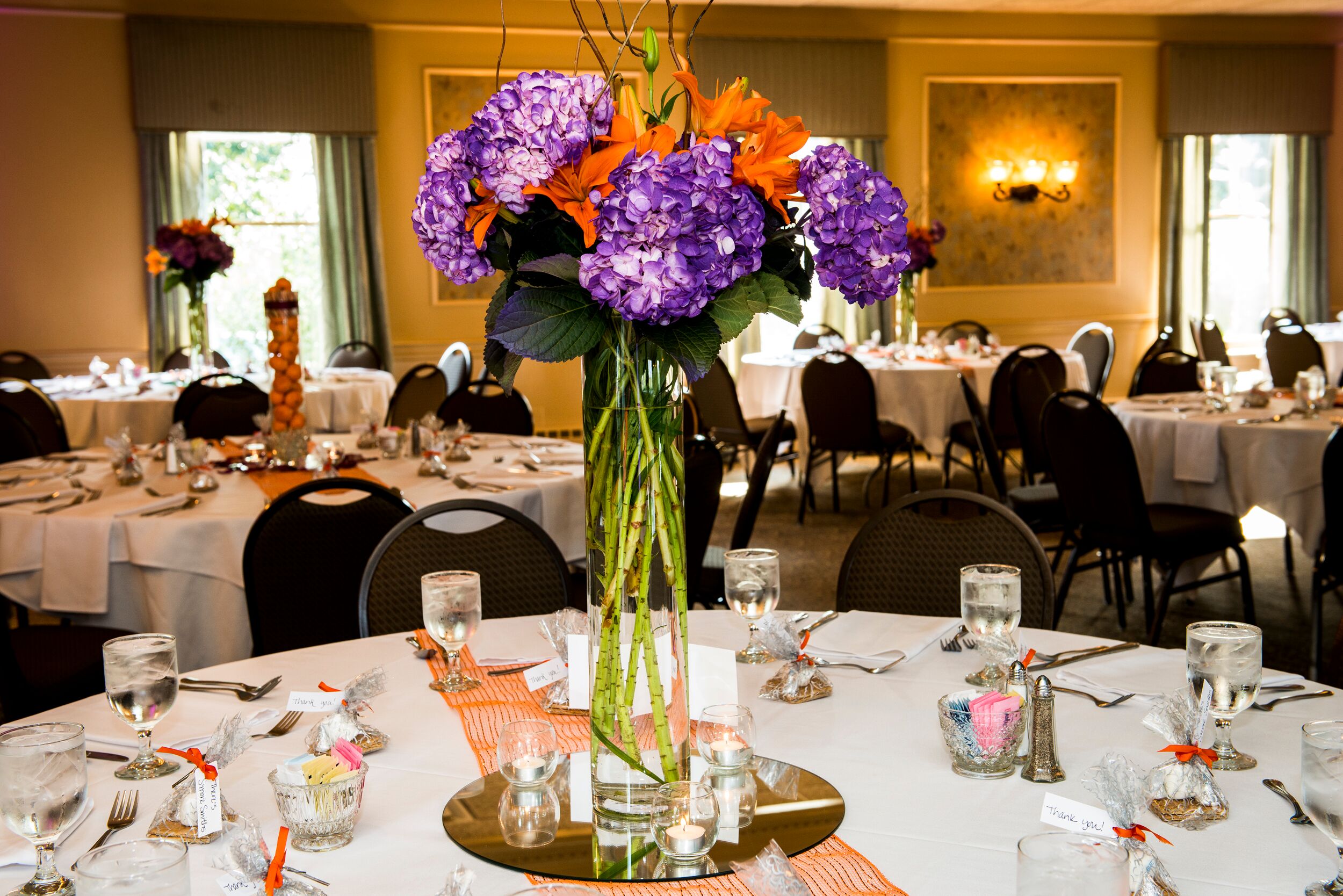 Bright Purple And Orange Centerpieces